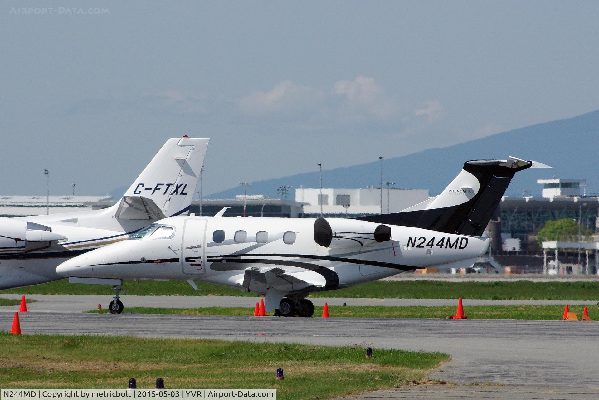 N244MD, 2011 Embraer EMB-500 Phenom 100 C/N 50000232, Seen at YVR