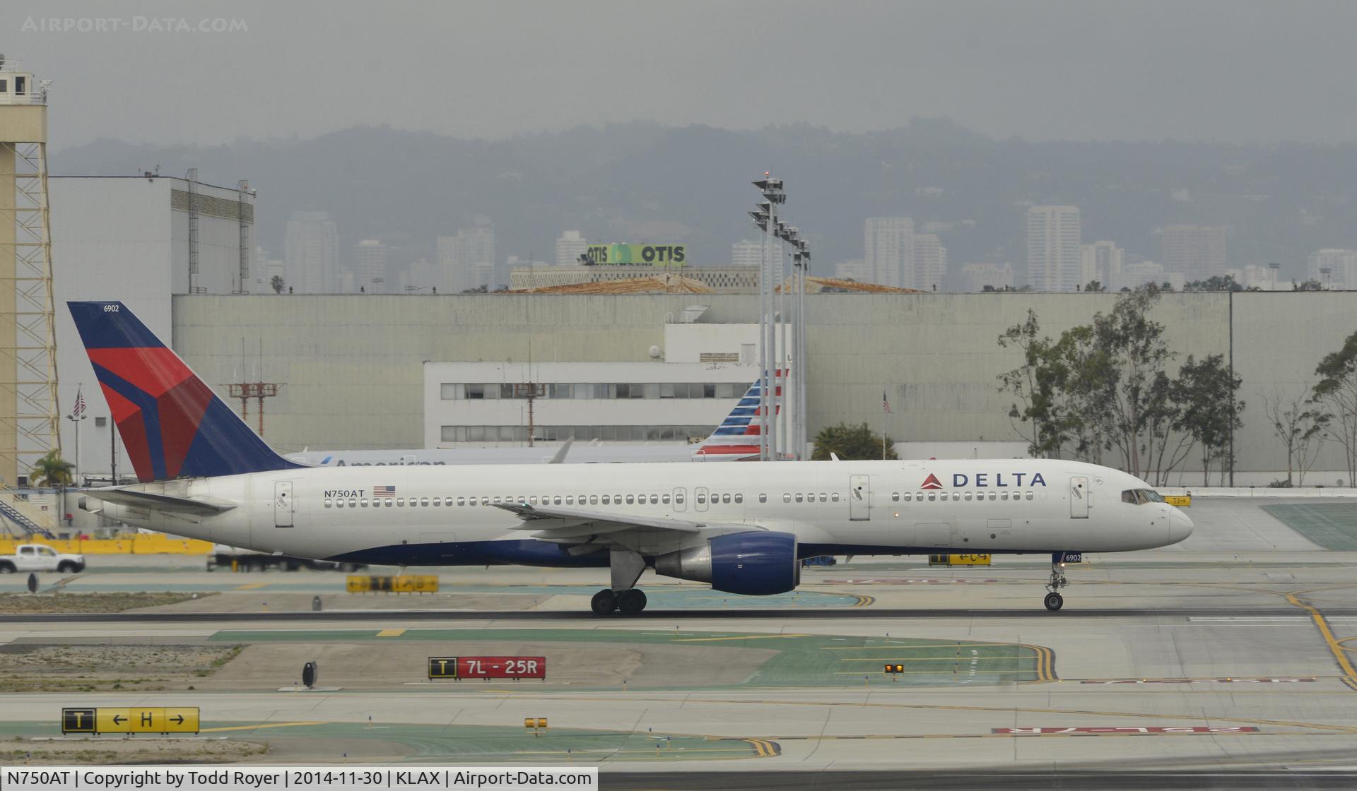 N750AT, 1984 Boeing 757-212 C/N 23126, Departing LAX on 7L