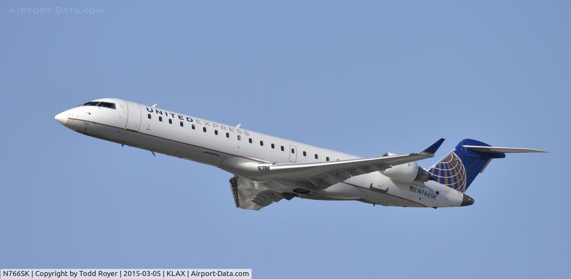 N766SK, 2005 Bombardier CRJ-702 (CL-600-2C10) Regional Jet C/N 10232, Departing LAX