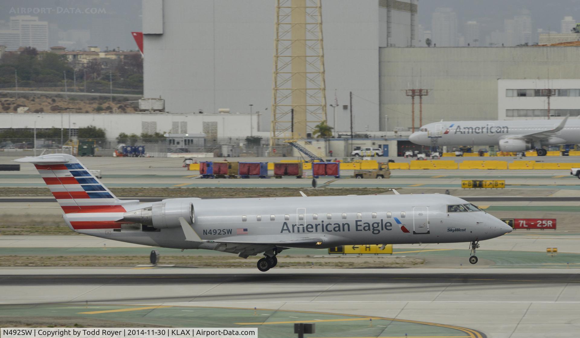 N492SW, 1997 Canadair CRJ-100ER (CL-600-2B19) C/N 7168, Landing at LAX on 7R