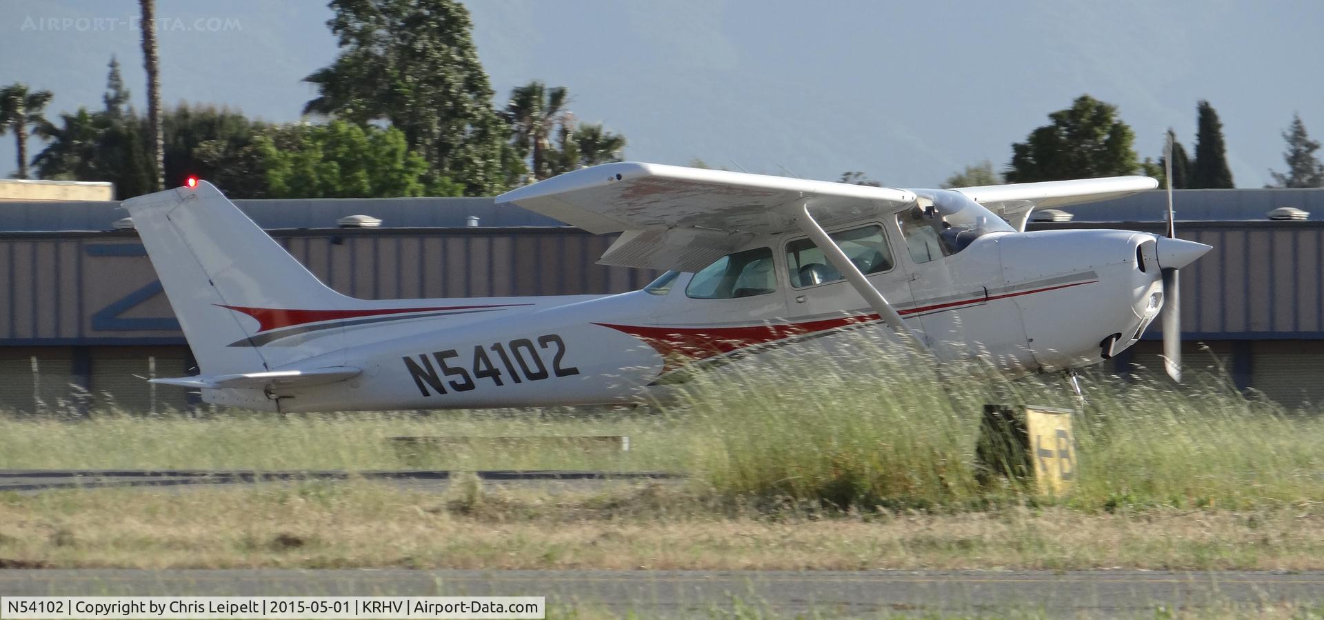 N54102, 1981 Cessna 172P C/N 17274875, A local 1981 Cessna 172P landing on runway 31R. Those darn weeds always get in the way of my best shots.