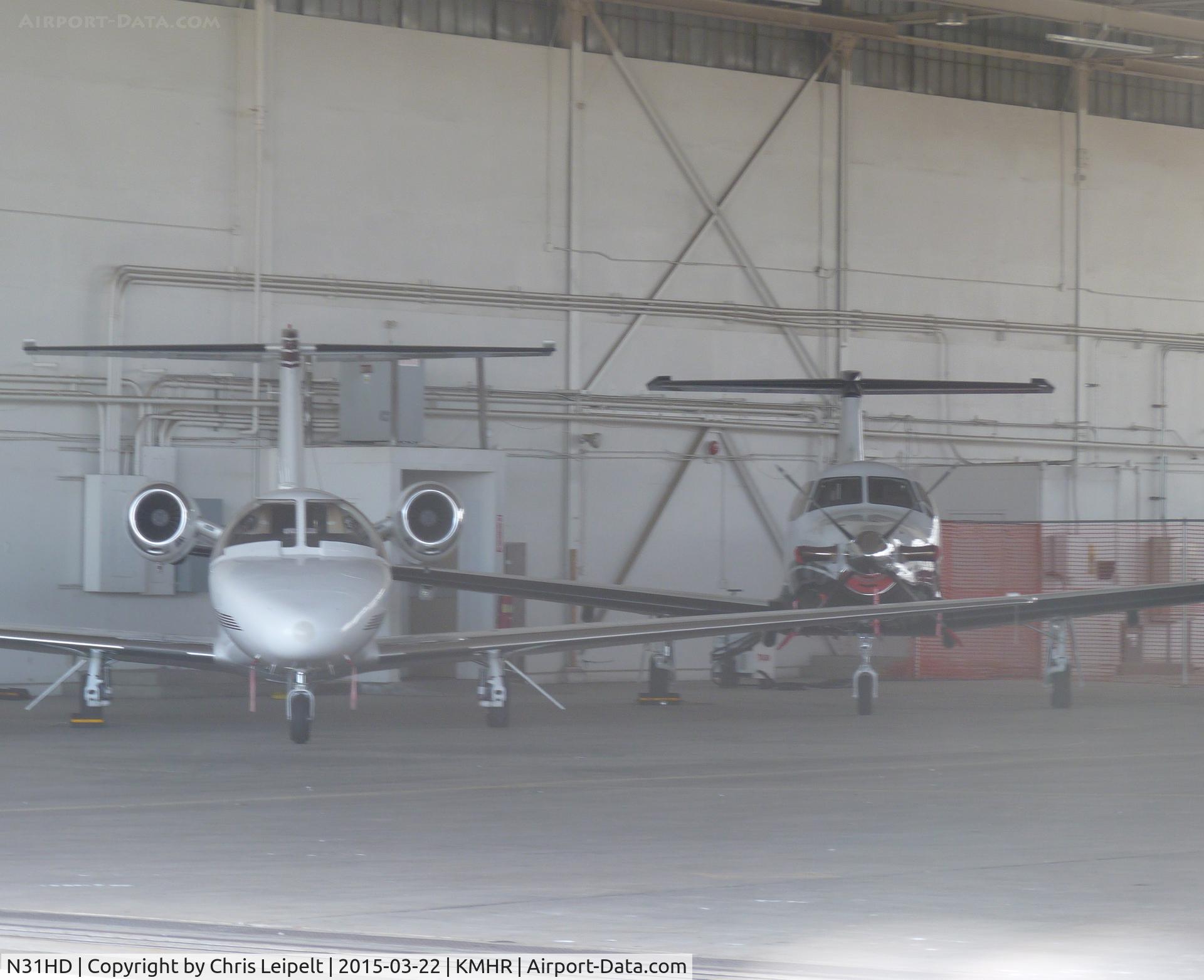 N31HD, 1998 Cessna 525 CitationJet CJ1 C/N 525-0261, A local 1998 Cessna 525 (CJ1) inside one of the larger hangars along with a PC-12 at Mather Airport, Sacramento, CA.