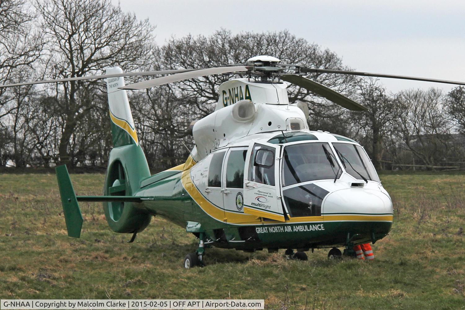 G-NHAA, 1991 Aerospatiale AS-365N-2 Dauphin C/N 6431, Great North Air Ambulance Aerospatiale AS-365N-2 Dauphin on an emergency call in Sedgefield Village UK. February 25th 2015.