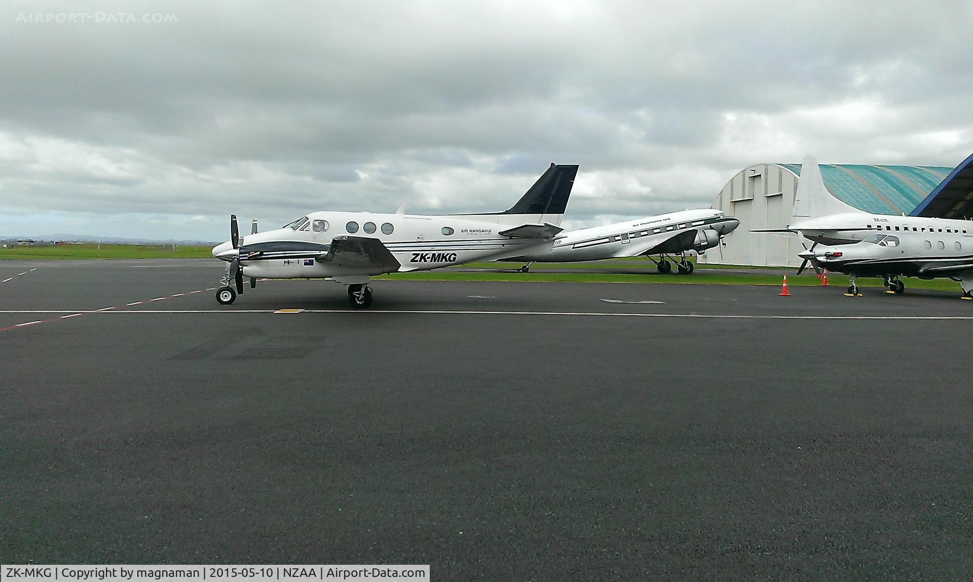 ZK-MKG, 1994 Beech C90A King Air C/N LJ-1367, on convair apron along with AWP / CIE / TFL