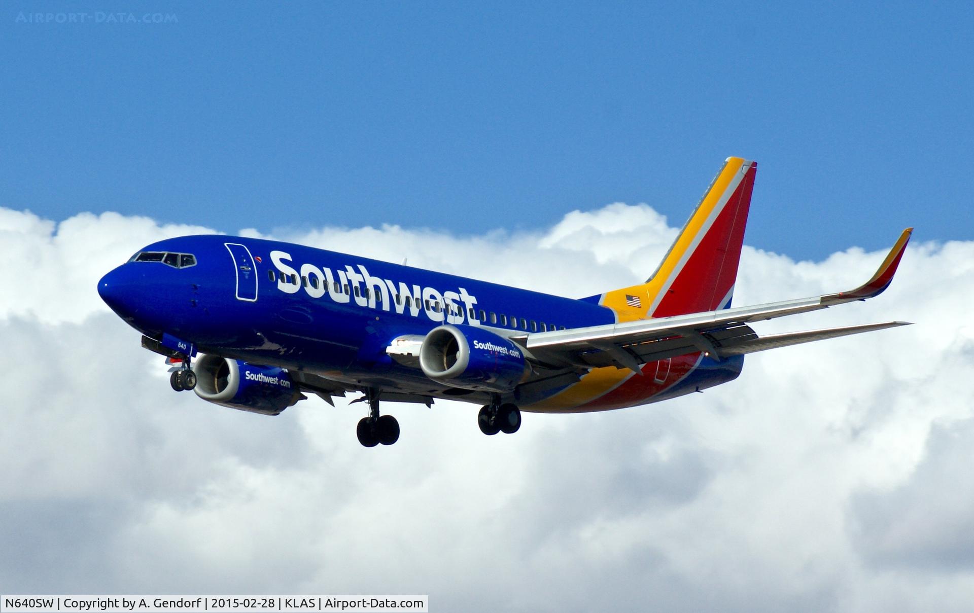 N640SW, 1996 Boeing 737-3H4 C/N 27713, Southwest Airlines, showing it's new colour in front of the cloud during approach at Las Vegas(KLAS)