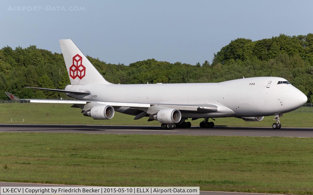 LX-ECV, 2009 Boeing 747-4HQF C/N 37303, departure via RW24