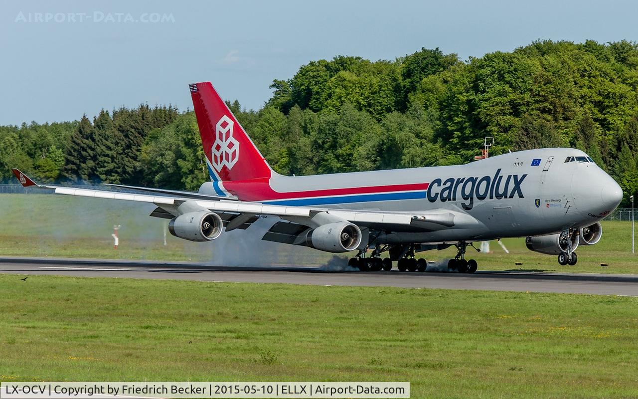 LX-OCV, 1999 Boeing 747-4R7F/SCD C/N 29731, touchdown on RW24