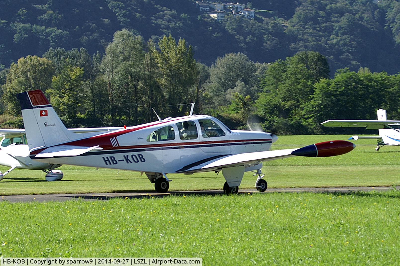 HB-KOB, 1965 Beech 35-C33 Debonair Debonair C/N CD-860, leaving the apron