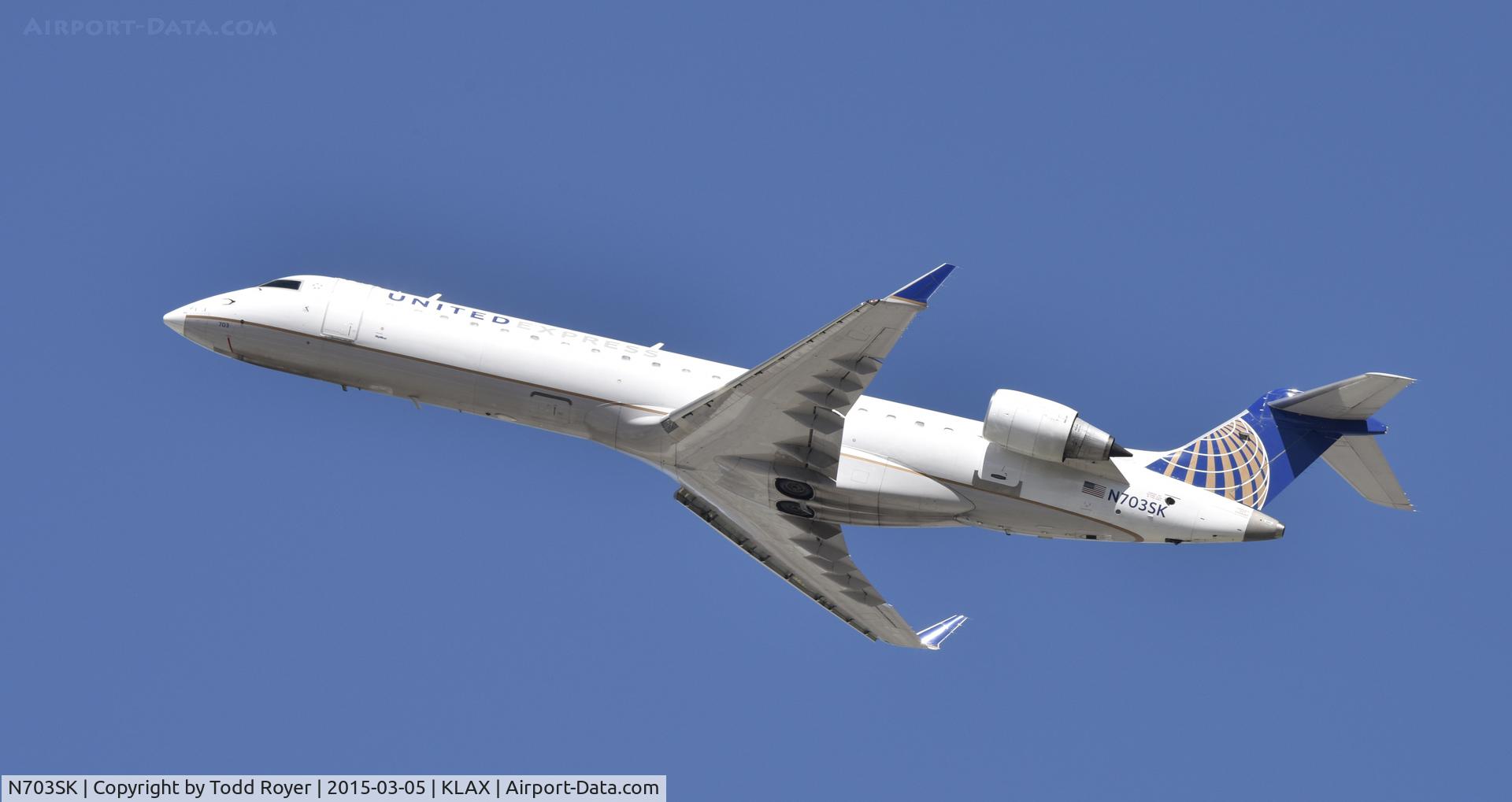 N703SK, 2004 Bombardier CRJ-701ER (CL-600-2C10) Regional Jet C/N 10139, Departing LAX