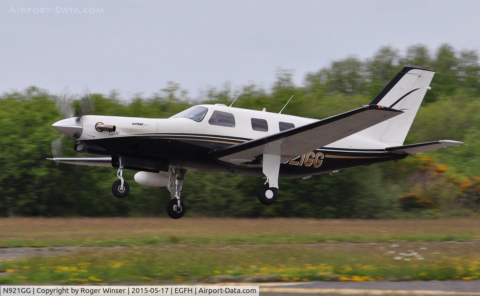 N921GG, 1998 Piper PA-46-350P Malibu Mirage C/N 4636136, Visiting Malibu Mirage Jet Prop DLX departing Runway 22.