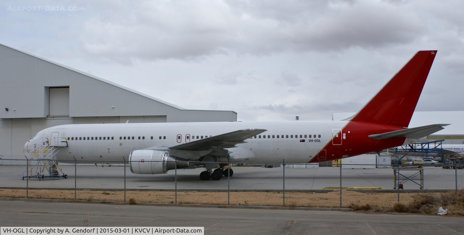 VH-OGL, 1991 Boeing 767-338 C/N 25363, Qantas (untitled), is here stored at Victorville(KVCV)