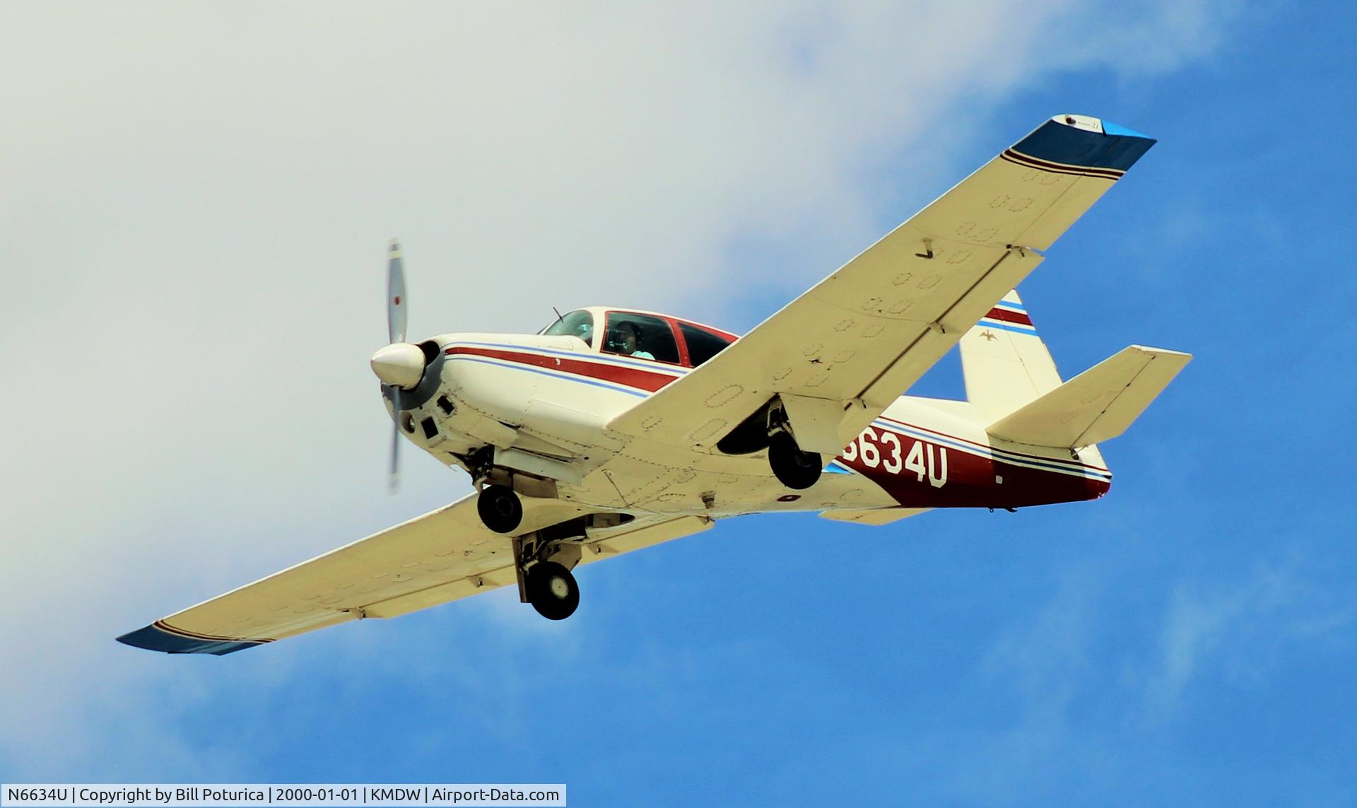 N6634U, 1963 Mooney M20D Master C/N 129, Landing 22R at Chicago Midway, 5/18/15.