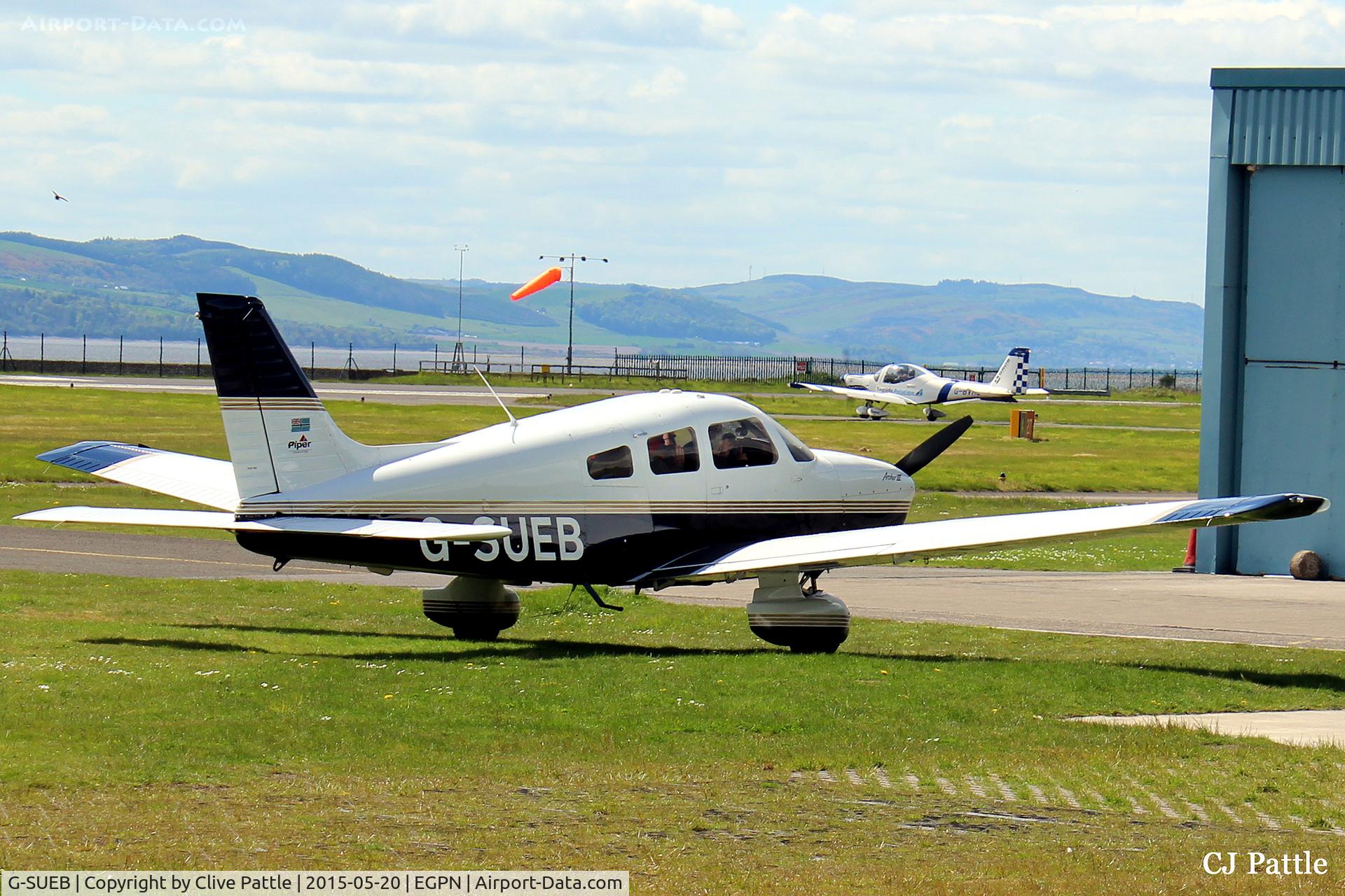 G-SUEB, 2001 Piper PA-28-181 Cherokee Archer III C/N 28-43466, A visitor with doors closed and cabin full ready for departure from Dundee Riverside airport (EGPN). A based Grob G115 Heron of Tayside Aviation taxies out for departure in the background.