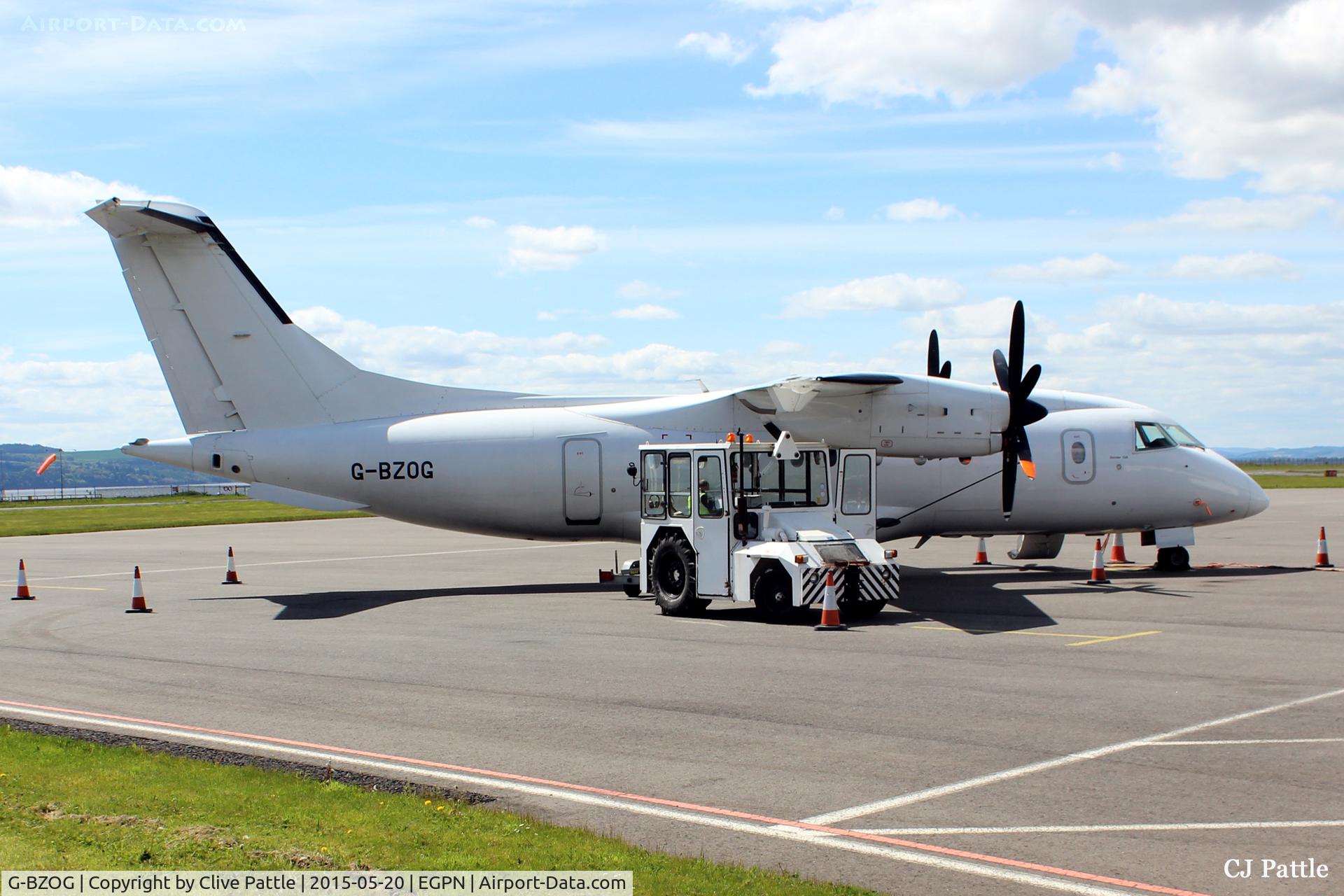 G-BZOG, 1998 Dornier 328-100 C/N 3088, On the ramp at Dundee Riverside airport (EGPN) being prepared for its return flight to London Stansted airport (EGSS)