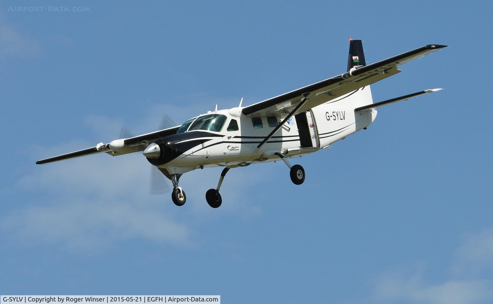 G-SYLV, 2002 Cessna 208B  Grand Caravan C/N 208B0936, Resident Grand Caravan operated by Skydive Swansea makes a steep approach to Runway 28.