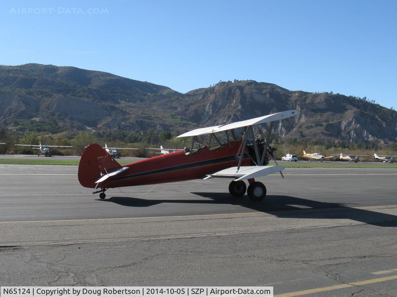 N65124, 1943 Boeing A75N1(PT17) C/N 75-1260, 1943 Boeing Stearman A75N1 (PT17) 'Spirit of OPEC', P&W R-985 Wasp Jr. by Jacobs 450 Hp upgrade, this aircraft has squared wingtips for greater wing area, taxi to Rwy 04. Will banner tow today-see SZP Airport for those photos.