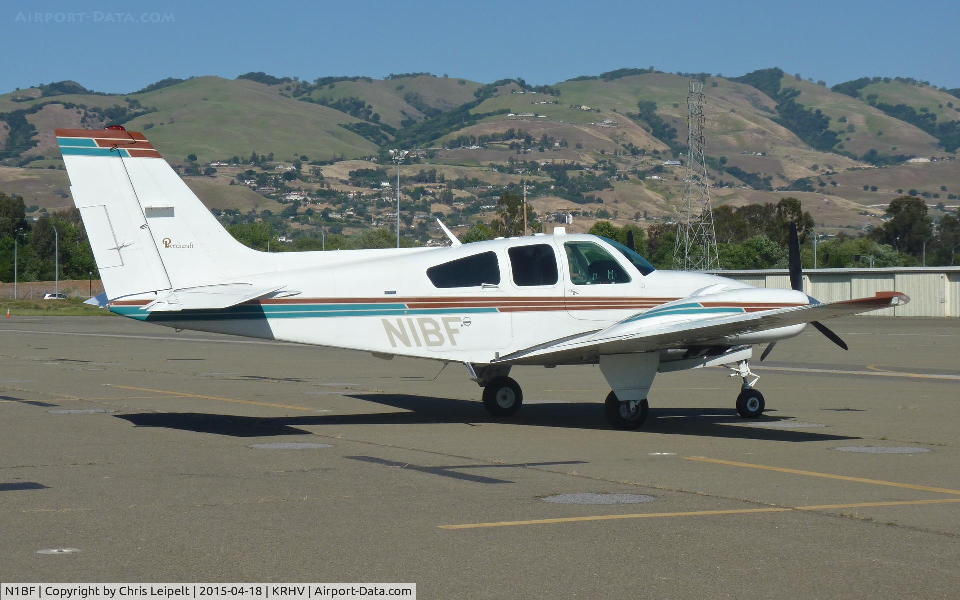 N1BF, 1973 Beech E-55 Baron C/N TE-961, A local 1973 Beechcraft Baron 55 sitting in front of its hangar after an IFR flight from Palm Springs. Photo taken at Reid Hillview Airport, CA.