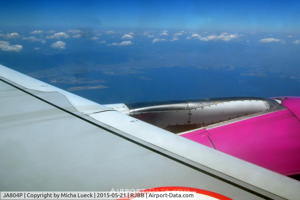 JA804P, 2012 Airbus A320-214 C/N 5166, Climbing out of Kansai after a 180 degree turn (you an see KIX next to the wing, above the engine)