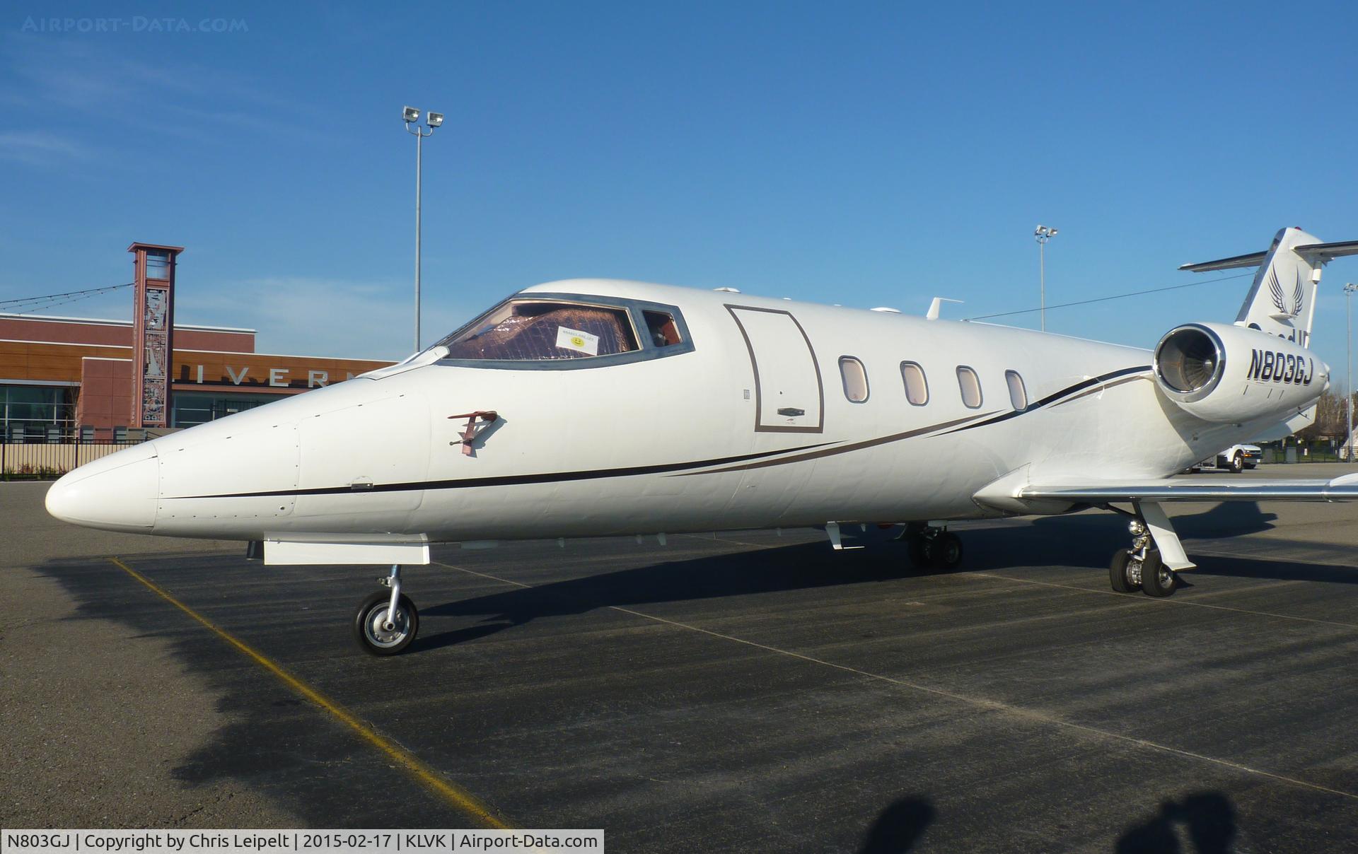 N803GJ, 2013 Gates Learjet 55 C/N 115, A 2013 LearJet 55 parked at transient parking visiting Livermore Municipal Airport, CA.
