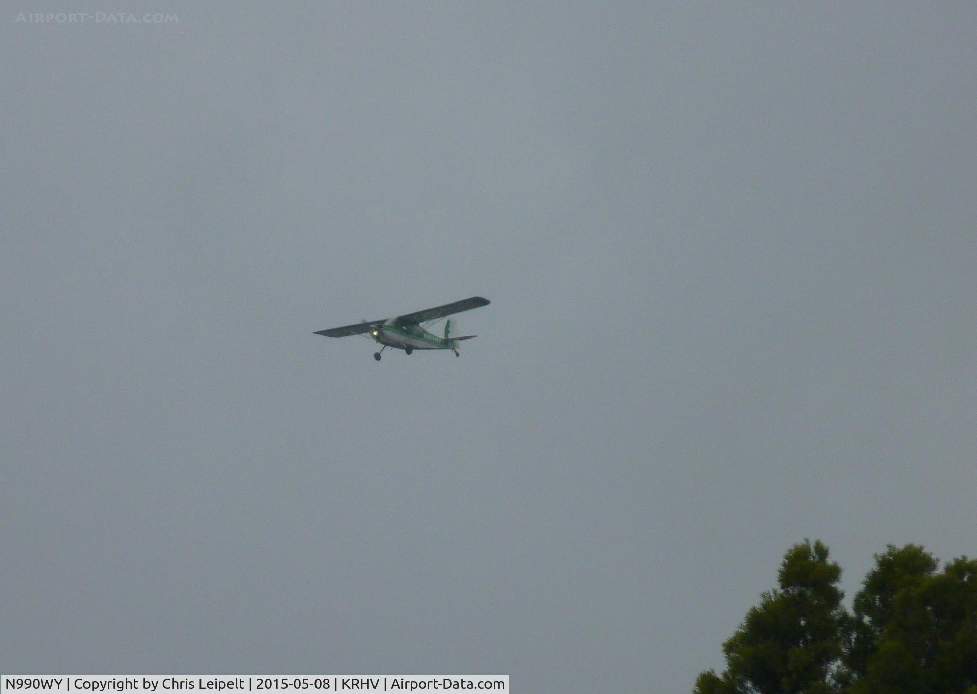 N990WY, 1976 Bellanca 7ECA Citabria C/N 1168-76, A 1976 Bellanca 7ECA landing during rainstorms on 31R at Reid Hillview Airport, CA.