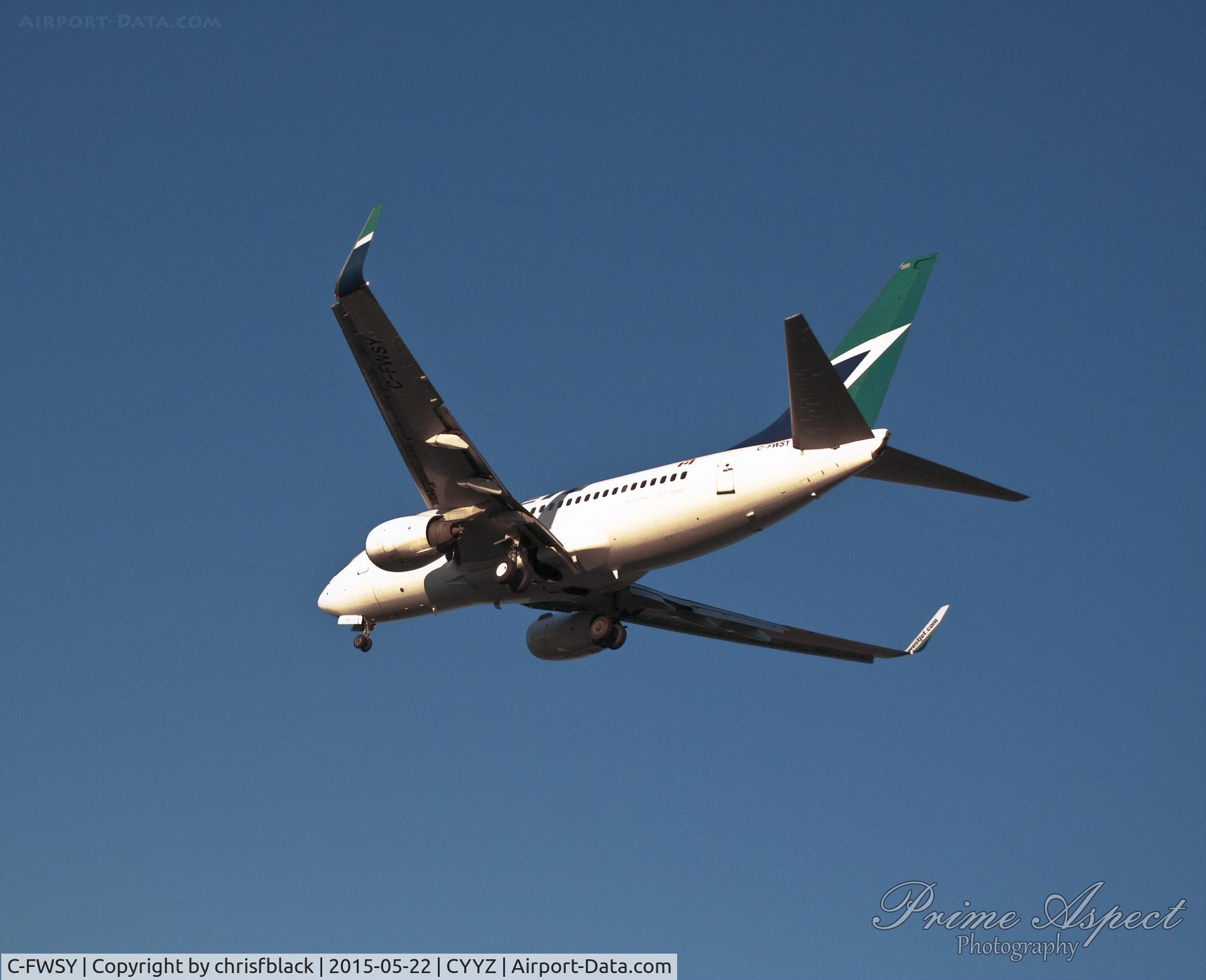 C-FWSY, 2004 Boeing 737-7CT C/N 32762, WestJet C-FWSY Landing on Runway 05 at Pearson International Airport from Edmonton.