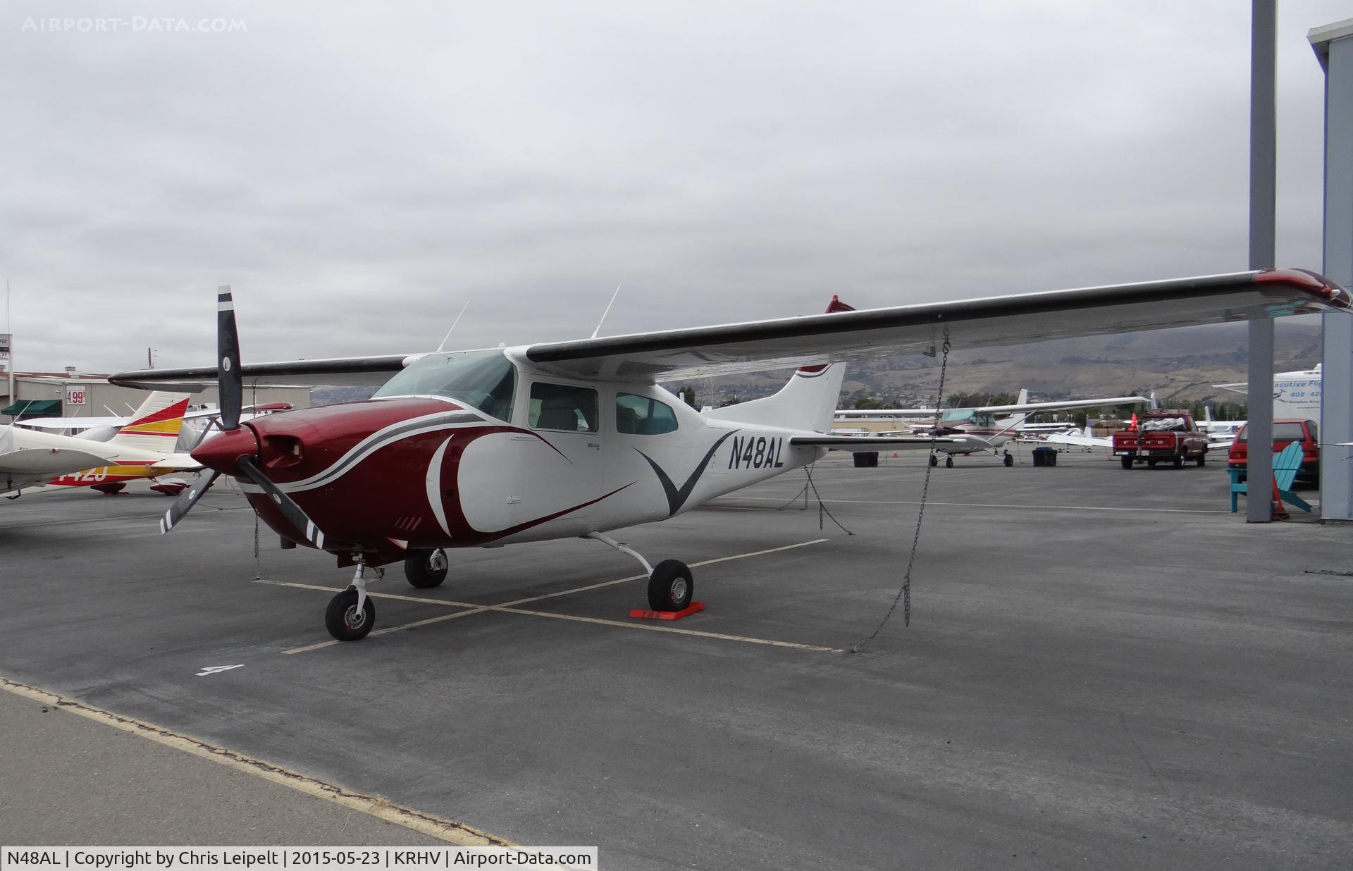 N48AL, 1976 Cessna T210M Turbo Centurion C/N 51363113, A local 1976 Cessna T210M Centurion sitting in front of the Trade Winds ramp at Reid Hillview Airport, CA.