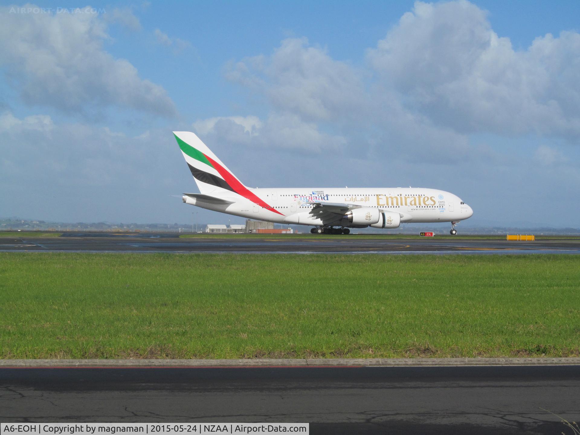 A6-EOH, 2014 Airbus A380-861 C/N 174, Touching down at AKL - with rugby world cup titles