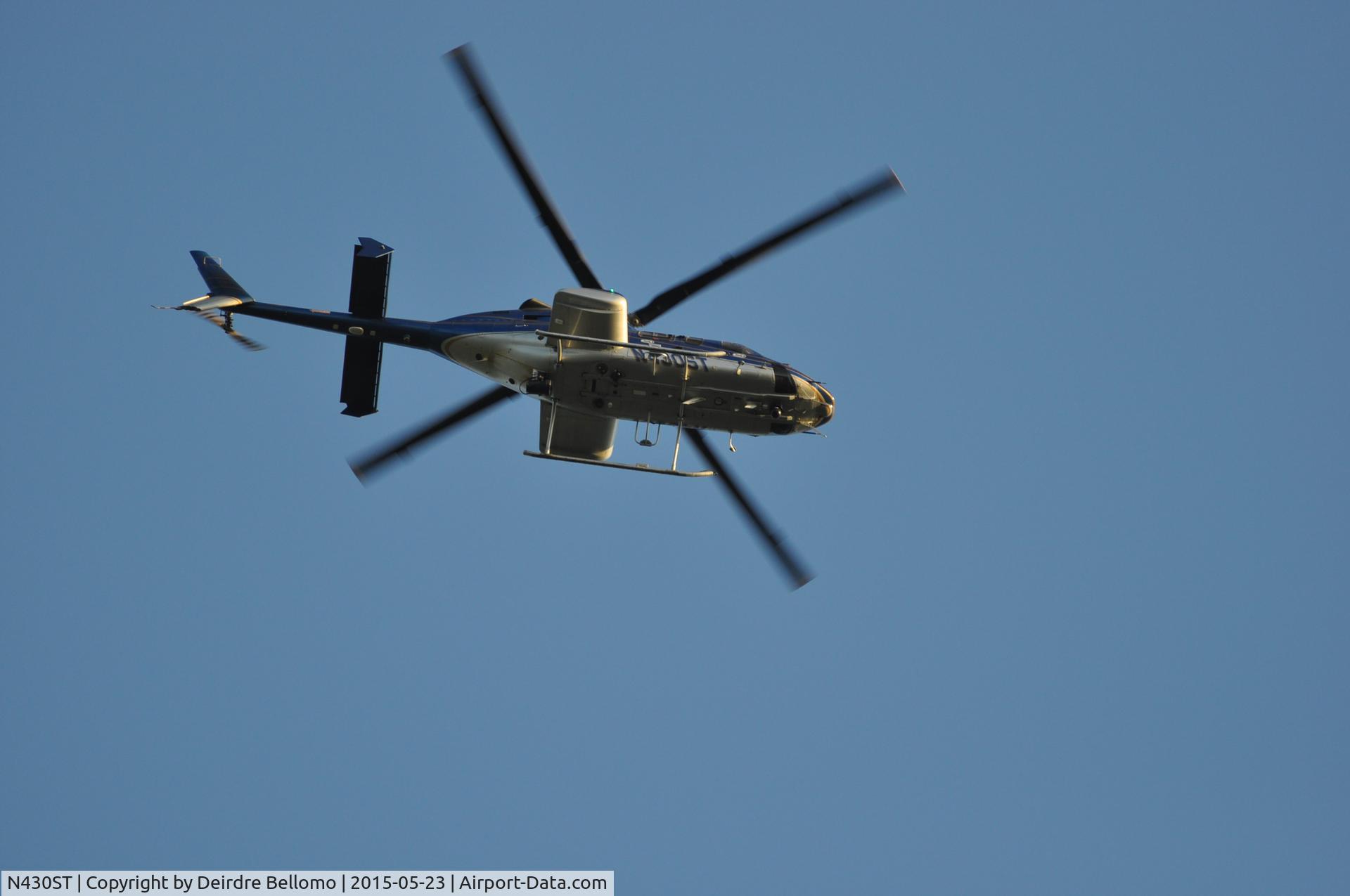 N430ST, 2000 Bell 430 C/N 49071, Taken over my home in Grosse Pointe Wooods , MI
