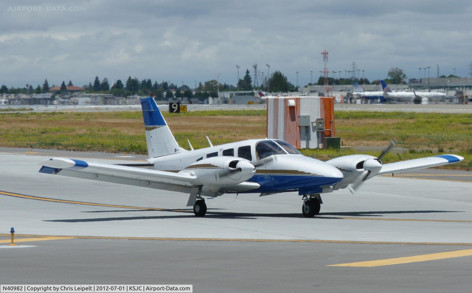 N40982, 1974 Piper PA-34-200 Seneca C/N 34-7450095, A Piper Seneca taxing out for departure on runway 30L at San Jose International Airport, CA.