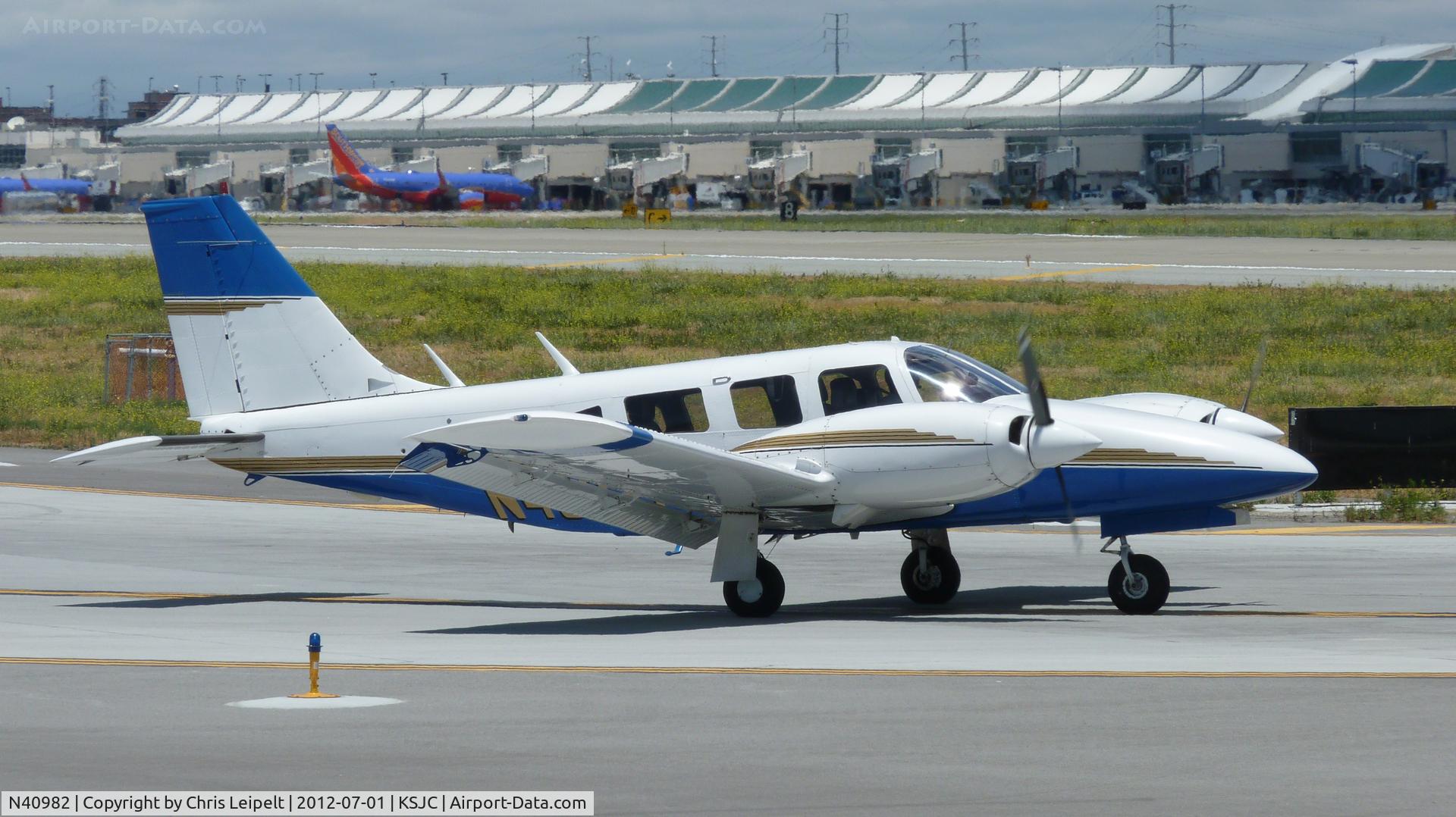 N40982, 1974 Piper PA-34-200 Seneca C/N 34-7450095, A Piper Seneca taxing out for departure on runway 30L at San Jose International Airport, CA.