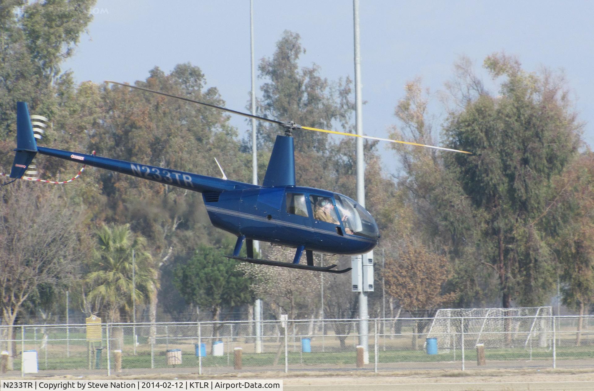 N233TR, 2003 Robinson R44 Raven II C/N 10062, Sierra Flite Robinson R44 II @ Mefford Field (Tulare, CA) for helicopter rides over the 2014 International Ag Expo