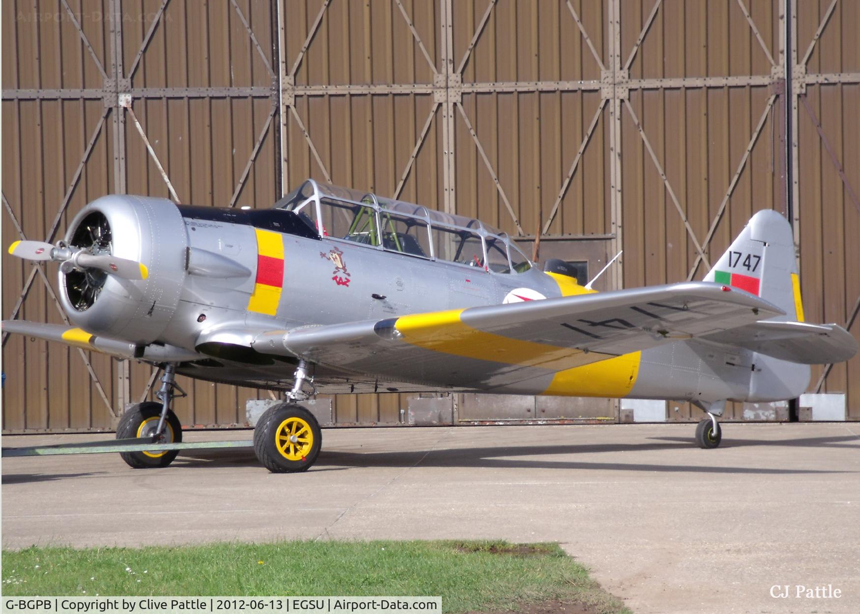 G-BGPB, 1953 Canadian Car & Foundry T-6 Harvard Mk.4 C/N CCF4-538, Basking in the summer sun at IWM Duxford - owned by the Aircraft Restoration Company - ex Portugese AF 1747