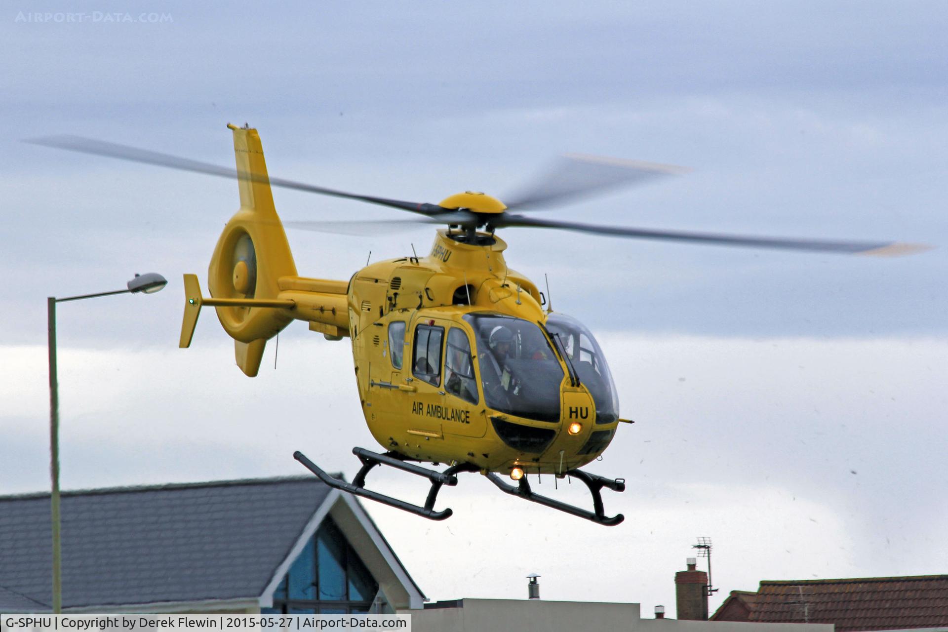 G-SPHU, 2002 Eurocopter EC-135T-2 C/N 0245, EC-135T-2, on temp deployment to EGFH as Helimed 57, seen lifting from the Locks Common area of Porthcawl.