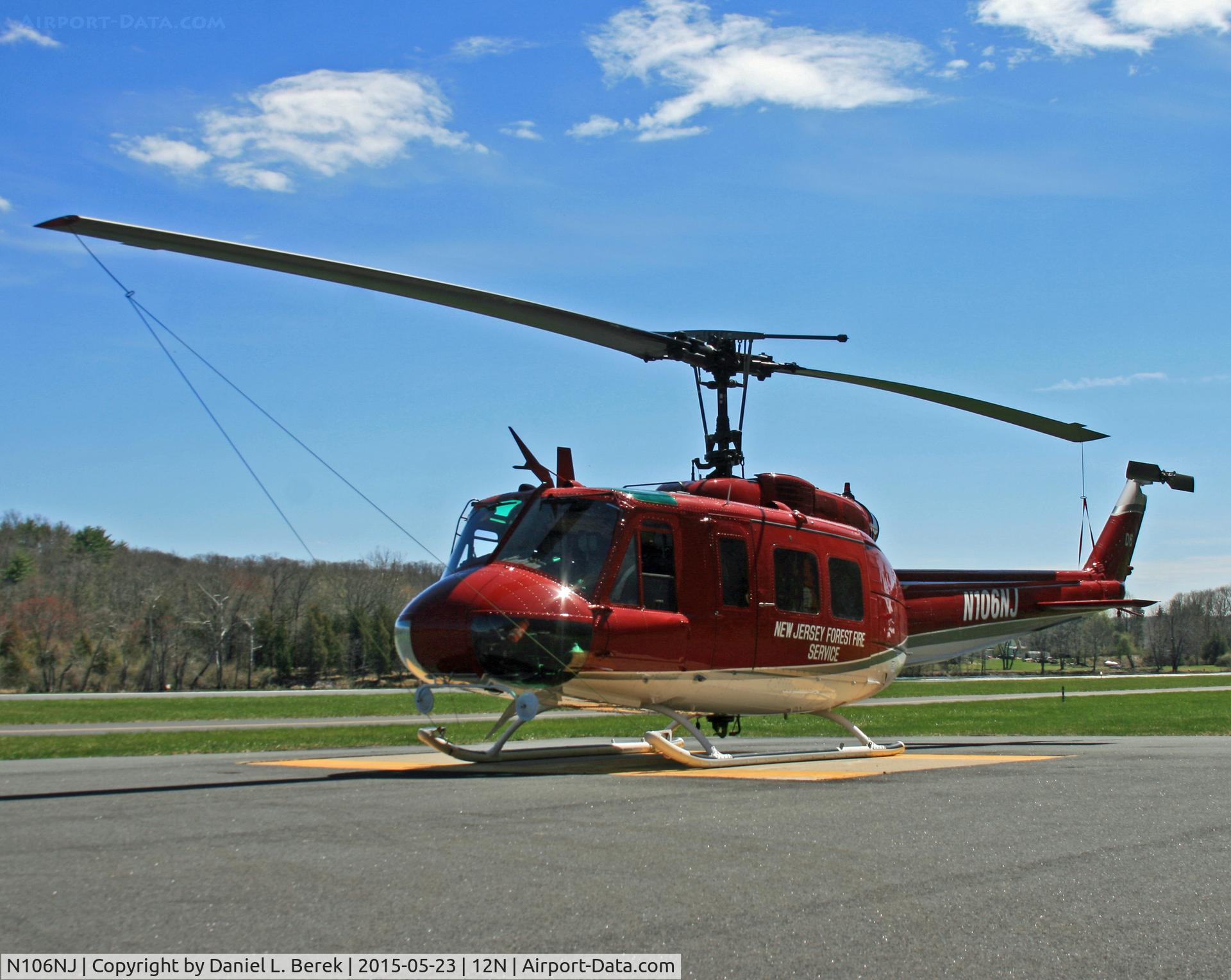 N106NJ, Bell UH-1H (205) Iroquois C/N 5724 (66-16030), Five years ago, this Huey was still in Army-issue olive.  Now she is seen, resplendent in her beautiful new color scheme.