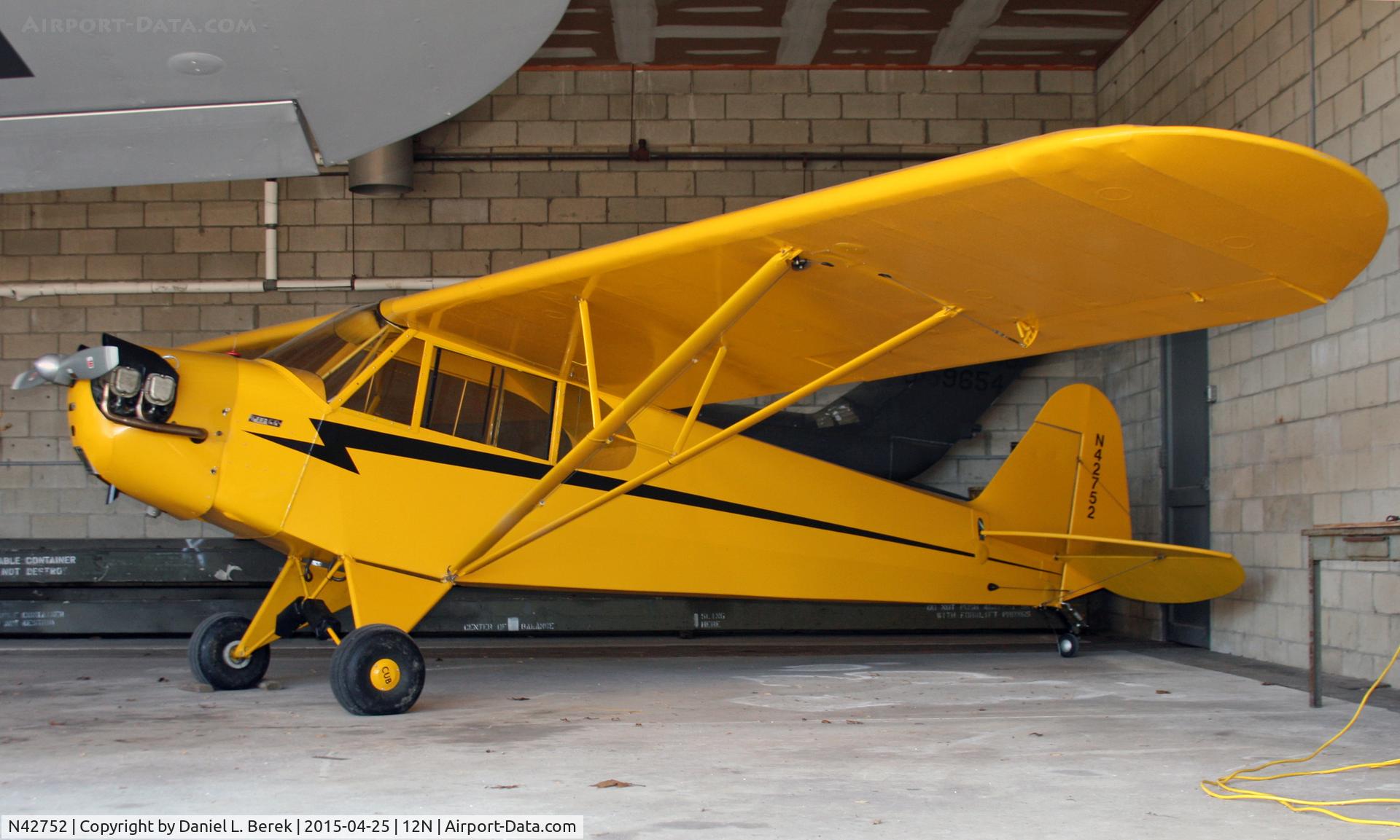 N42752, Piper J3C-65 Cub C/N 15057, One of several lovely yellow Piper Cubs at Andover Aeroflex.