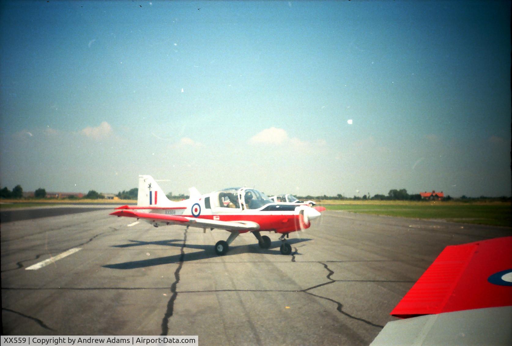 XX559, 1973 Scottish Aviation Bulldog T.1 C/N BH.120/255, Ready to tax from for a formation take-off.  We were flying from Glasgow to Cornwall for our summer camp.  We had just stopped for lunch and were about to do our second leg of the journey.