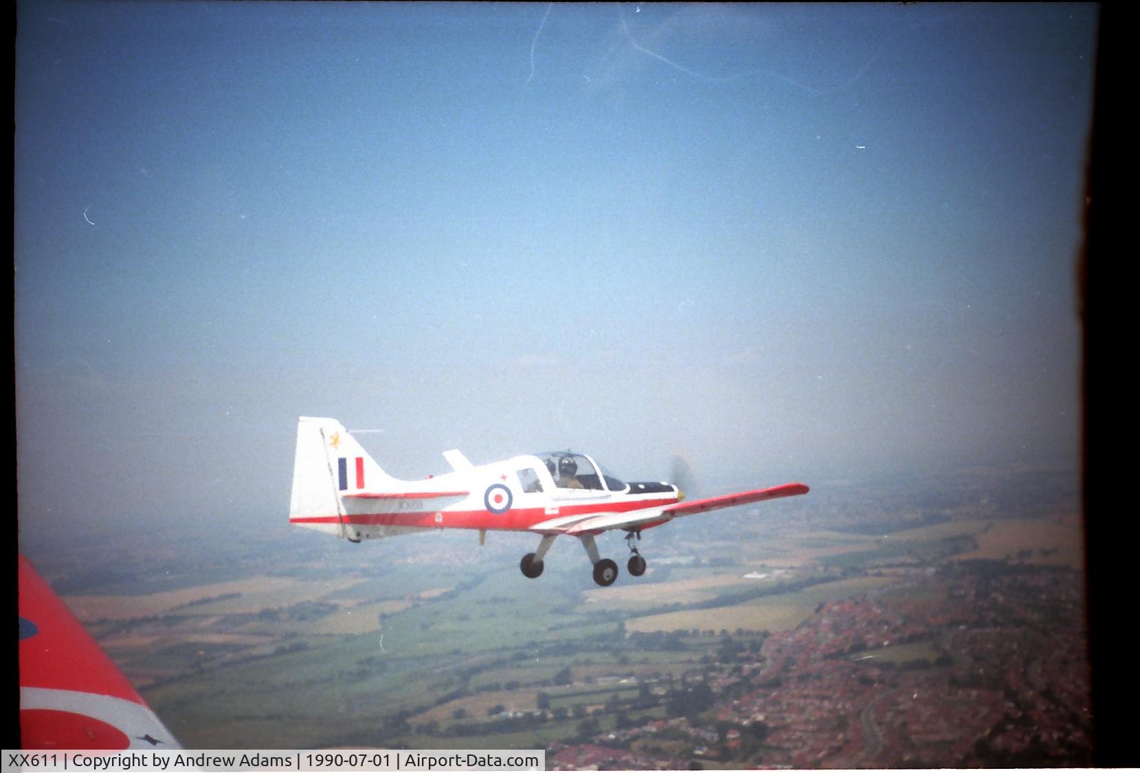 XX611, 1974 Scottish Aviation Bulldog T.1 C/N BH120/259, On a flight from Glasgow to Cornwall during the summer of 1990.  This was one of 4 bulldog we had during my time at UGSAS.  XX 611 had the yellow 'Dove Kebab' on the tail.