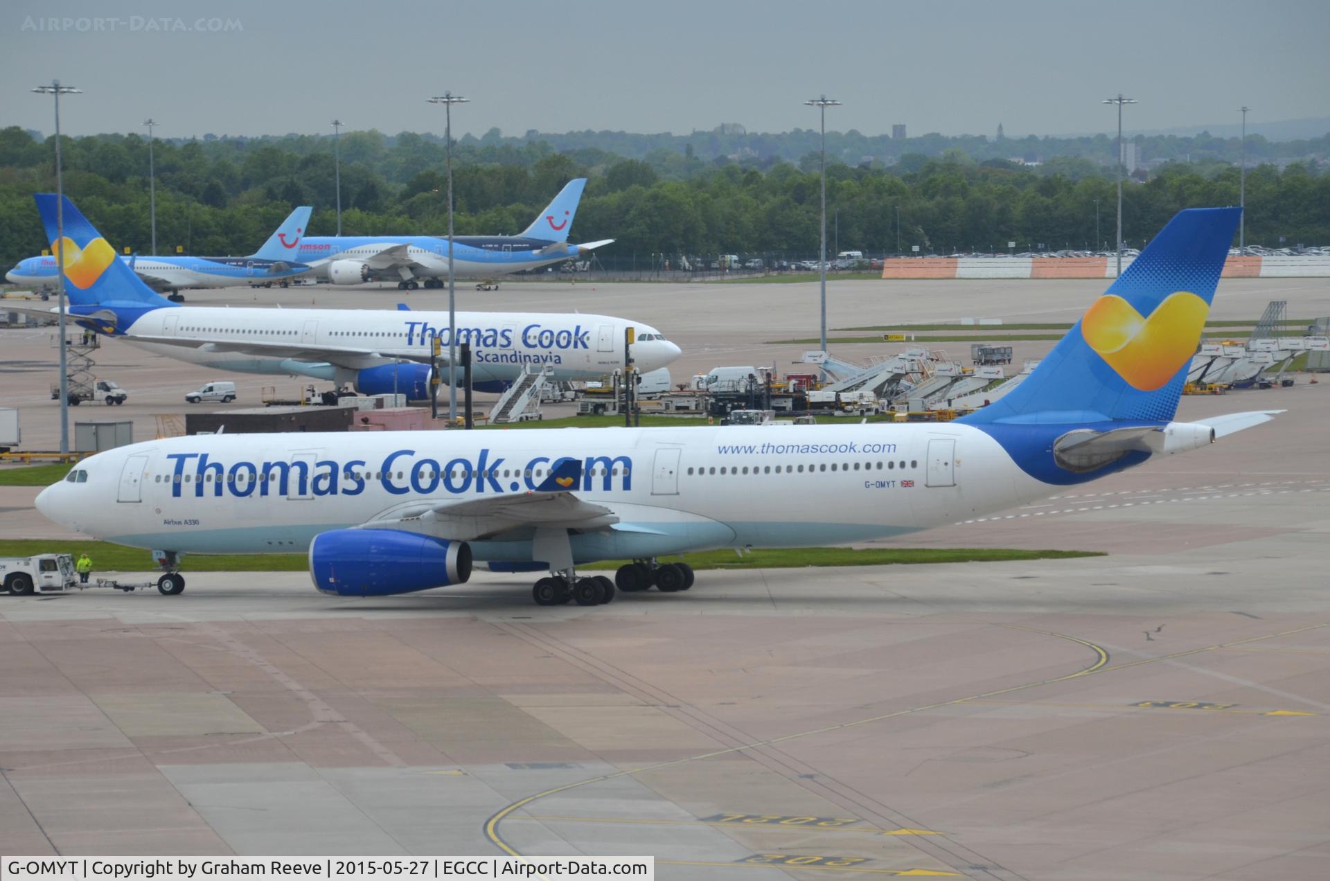 G-OMYT, 1999 Airbus A330-243 C/N 301, Under tow at Manchester.
