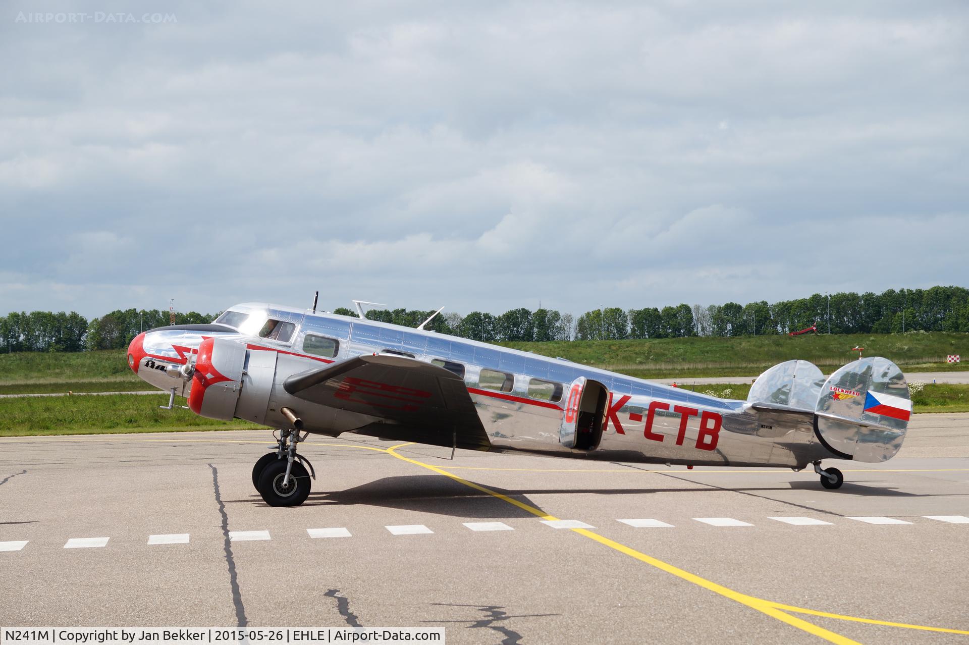 N241M, 1937 Lockheed Electra 10-A C/N 1091, At the apron of Lelystad Airport (door open) for a refill on its way from America to the Czechian Republic.( Originaly owned by Bata Shoe company before the war an now coming back).
