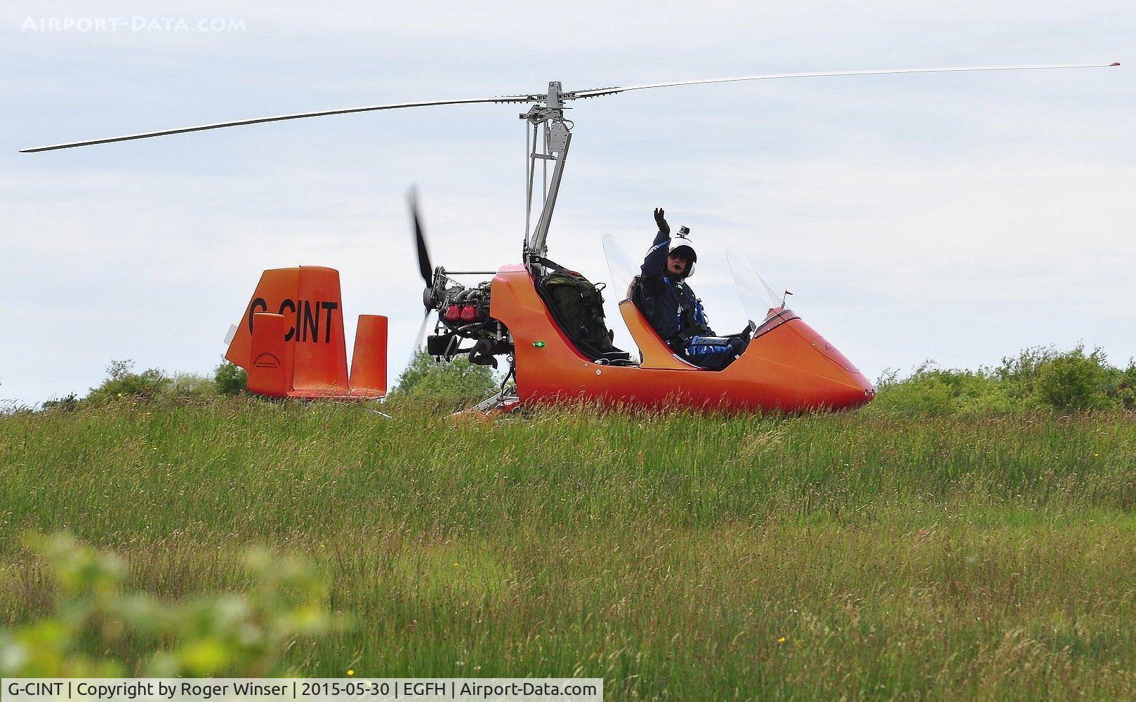 G-CINT, 2014 Rotorsport Uk MTOsport C/N RSUK/MTOS/056, Visiting MTOSport gyroplane. Thanks for the wave. Based at HMS Heron.