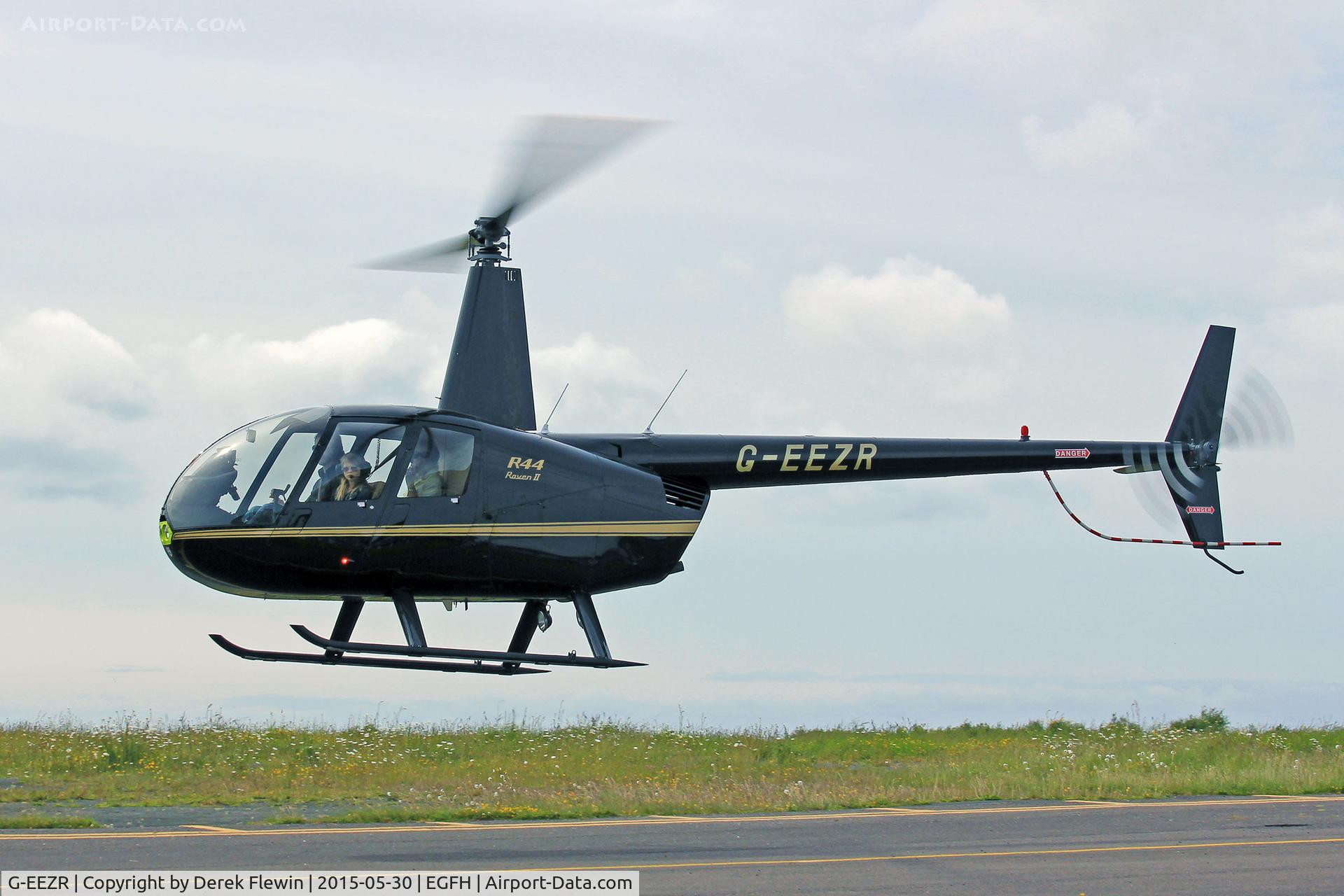 G-EEZR, 2006 Robinson R44 Raven II C/N 11391, Raven II, Thruxton based, hover taxxing.