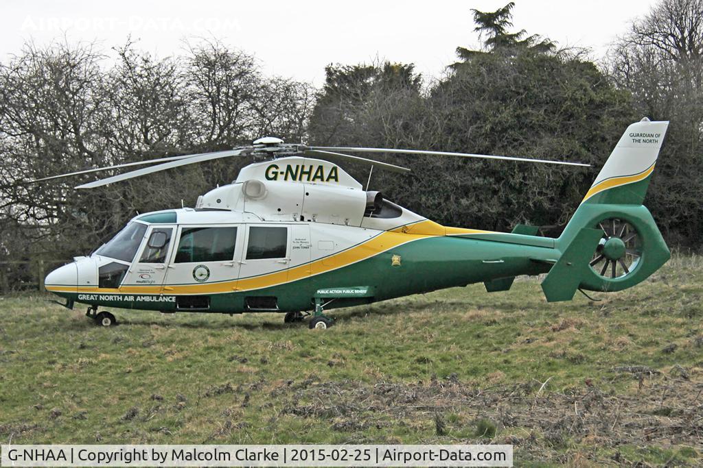 G-NHAA, 1991 Aerospatiale AS-365N-2 Dauphin C/N 6431, Great North Air Ambulance Aerospatiale AS-365N-2 Dauphin on an emergency call in Sedgefield Village UK. February 25th 2015.