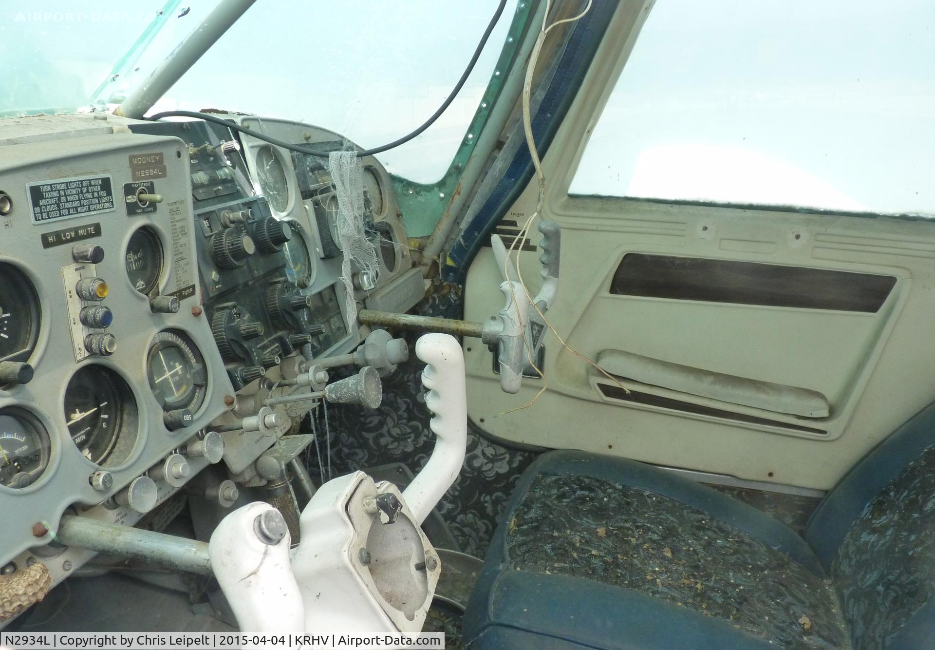 N2934L, 1967 Mooney M20C Ranger C/N 670068, The cockpit of a local 1967 Mooney M20C rotting at its usual parking spot at Reid Hillview Airport, CA. Believe it or not this guy still pays his parking fee.If you look closely in the bottom left corner, a bees nest is in the cockpit!