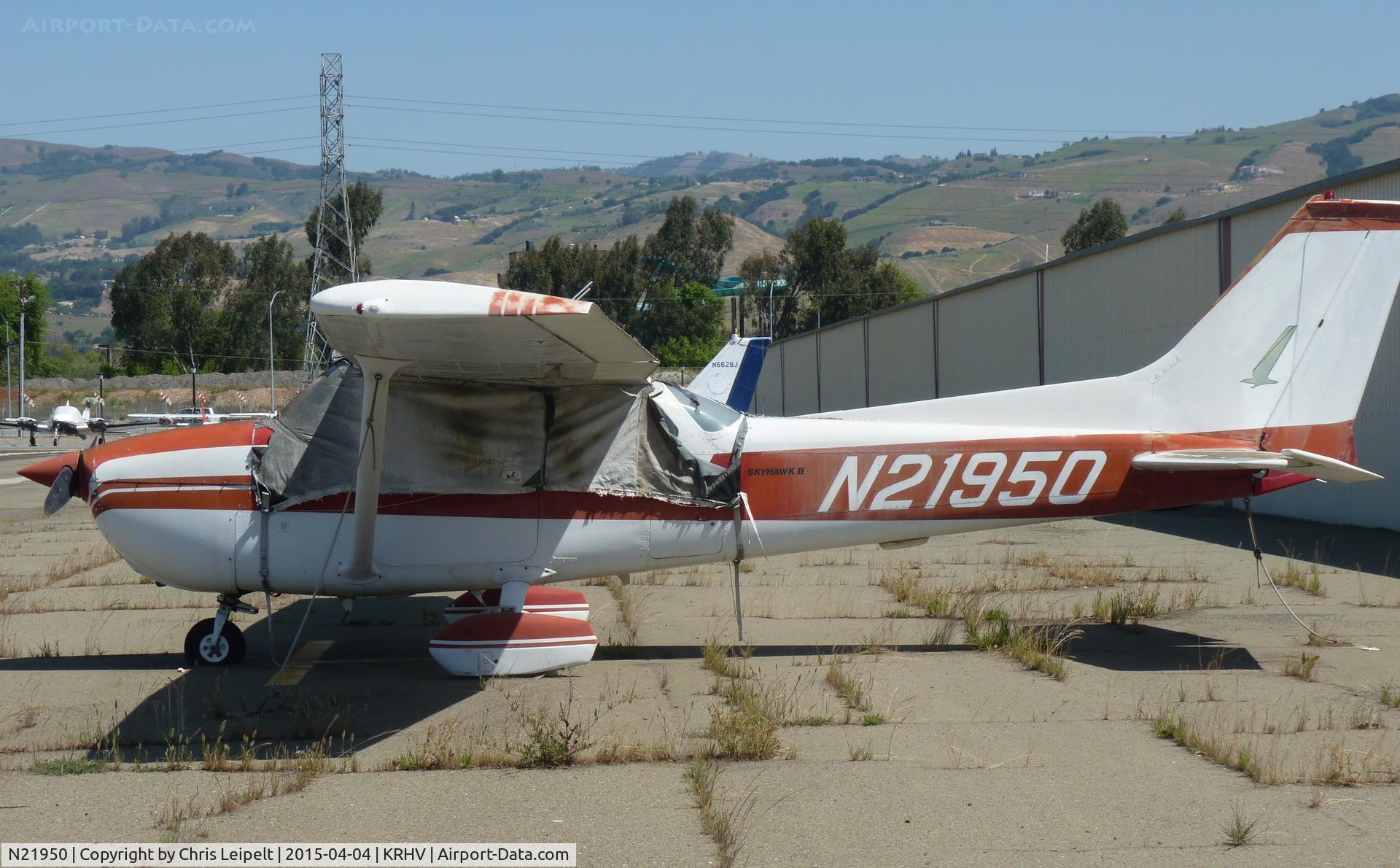 N21950, 1975 Cessna 172M C/N 17264046, A local 1975 Cessna 172M sitting at one of the older tie downs at Reid Hillview Airport, CA.