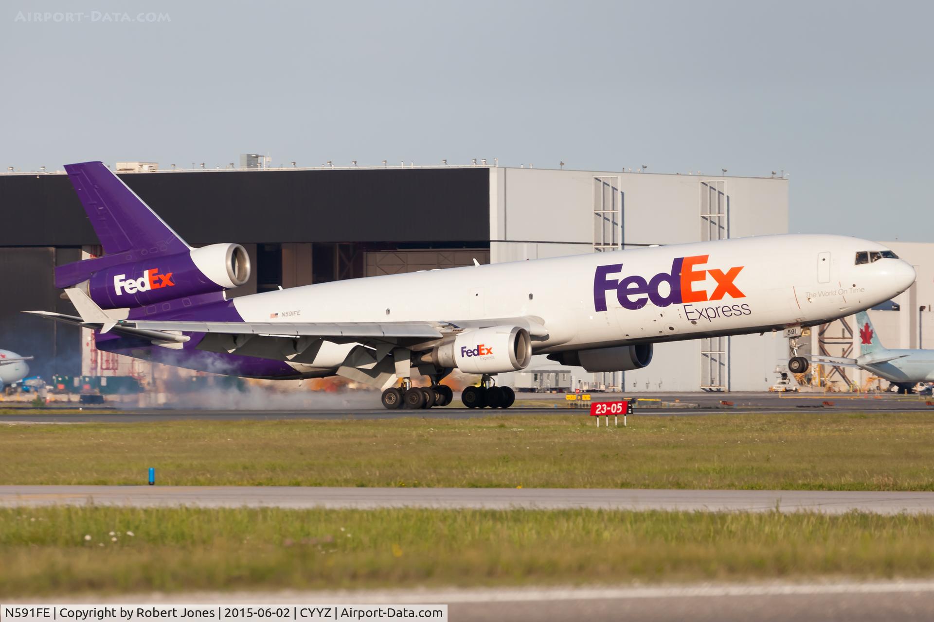N591FE, 1992 McDonnell Douglas MD-11F C/N 48527, Landing in Toronto.