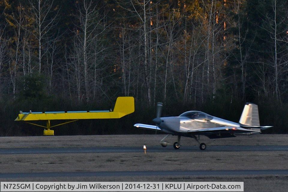 N725GM, 2014 Vans RV-9A C/N 1001, RV-9A landing at sunset on New Years eve.