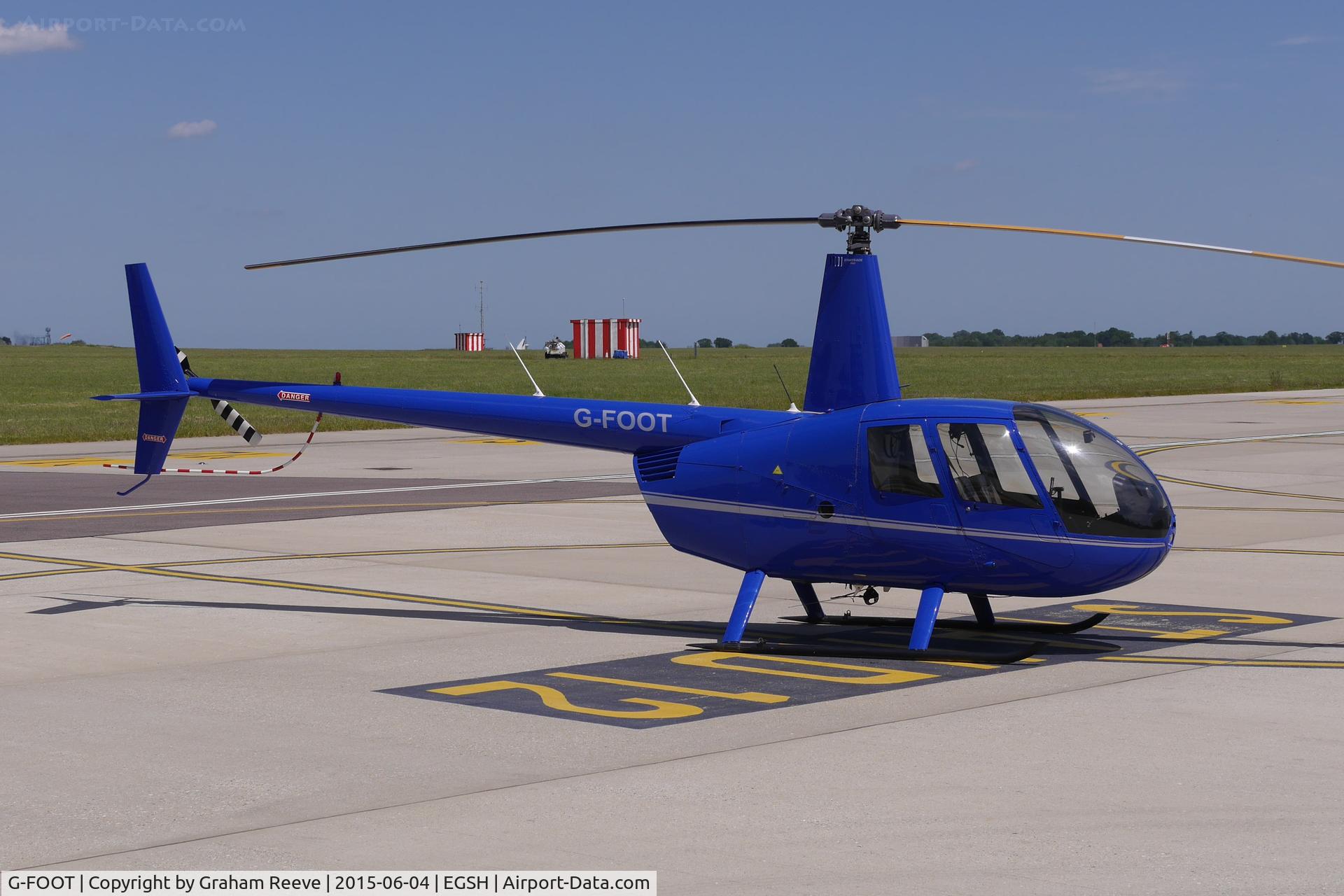 G-FOOT, 2008 Robinson R44 Raven I C/N 1891, Parked at Norwich.