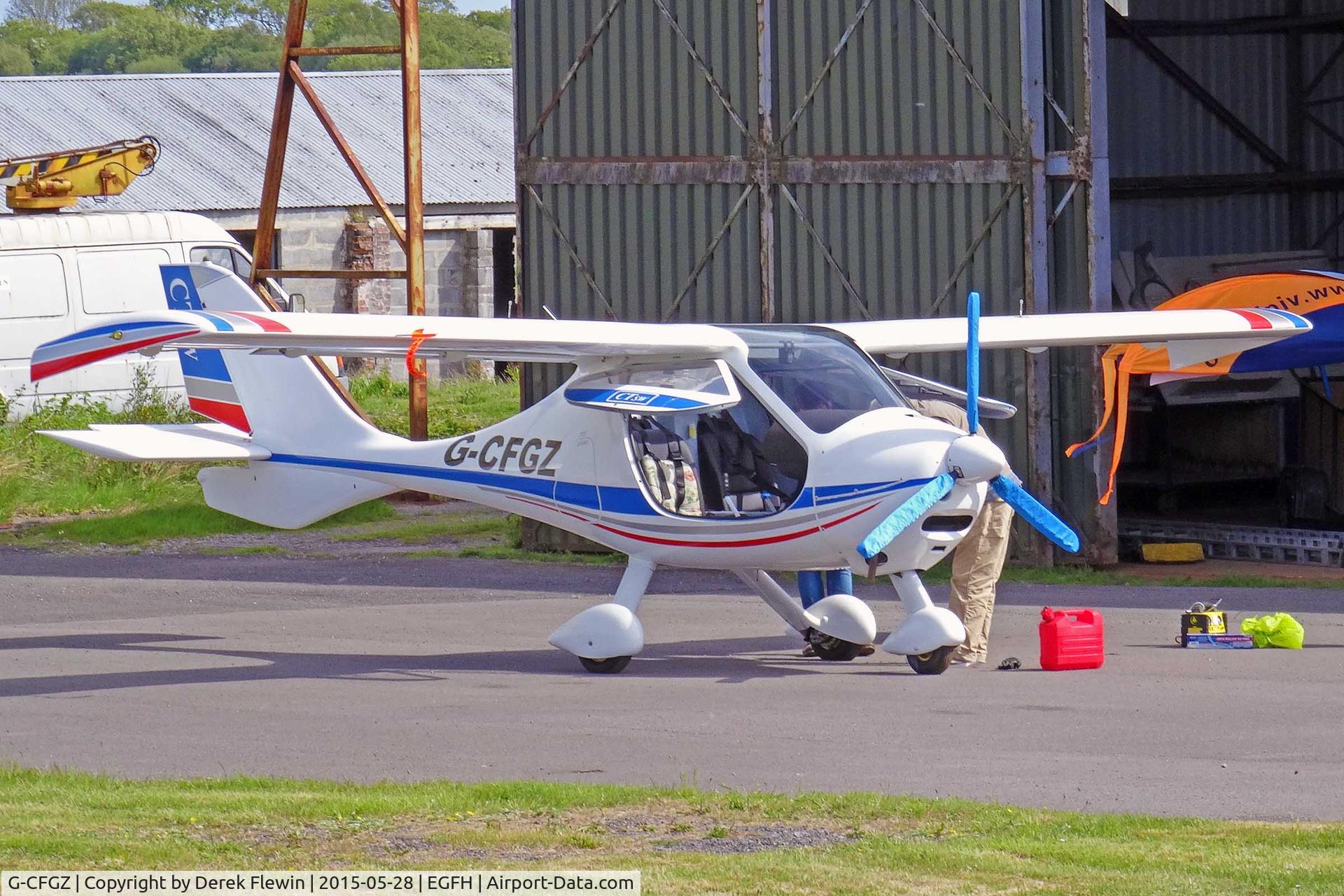 G-CFGZ, 2008 Flight Design CTSW C/N 8390, Resident Flight Design CTSW, seen being worked on outside the hangar.