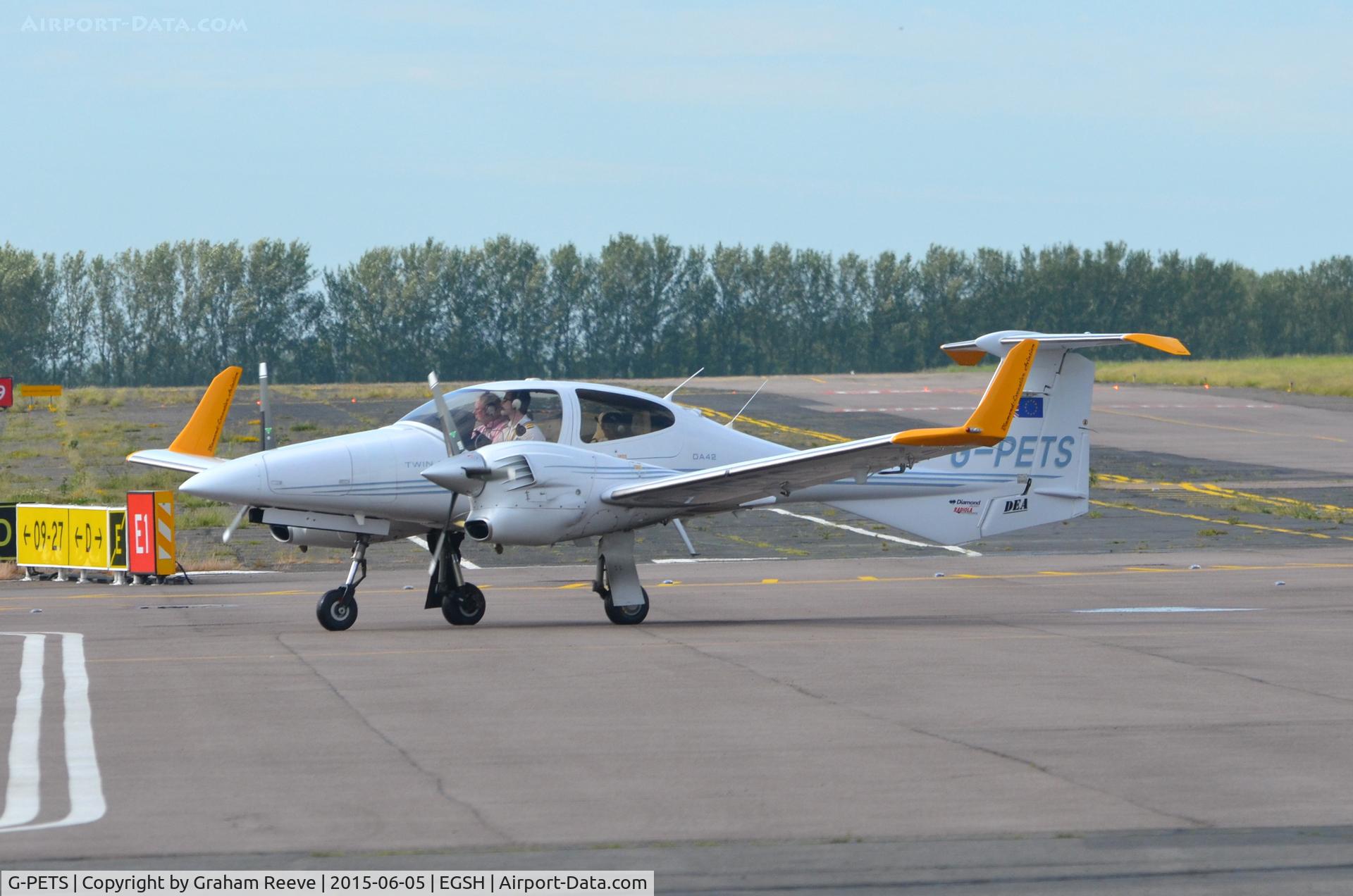 G-PETS, 2006 Diamond DA-42 Twin Star C/N 42.169, Just landed at Norwich.