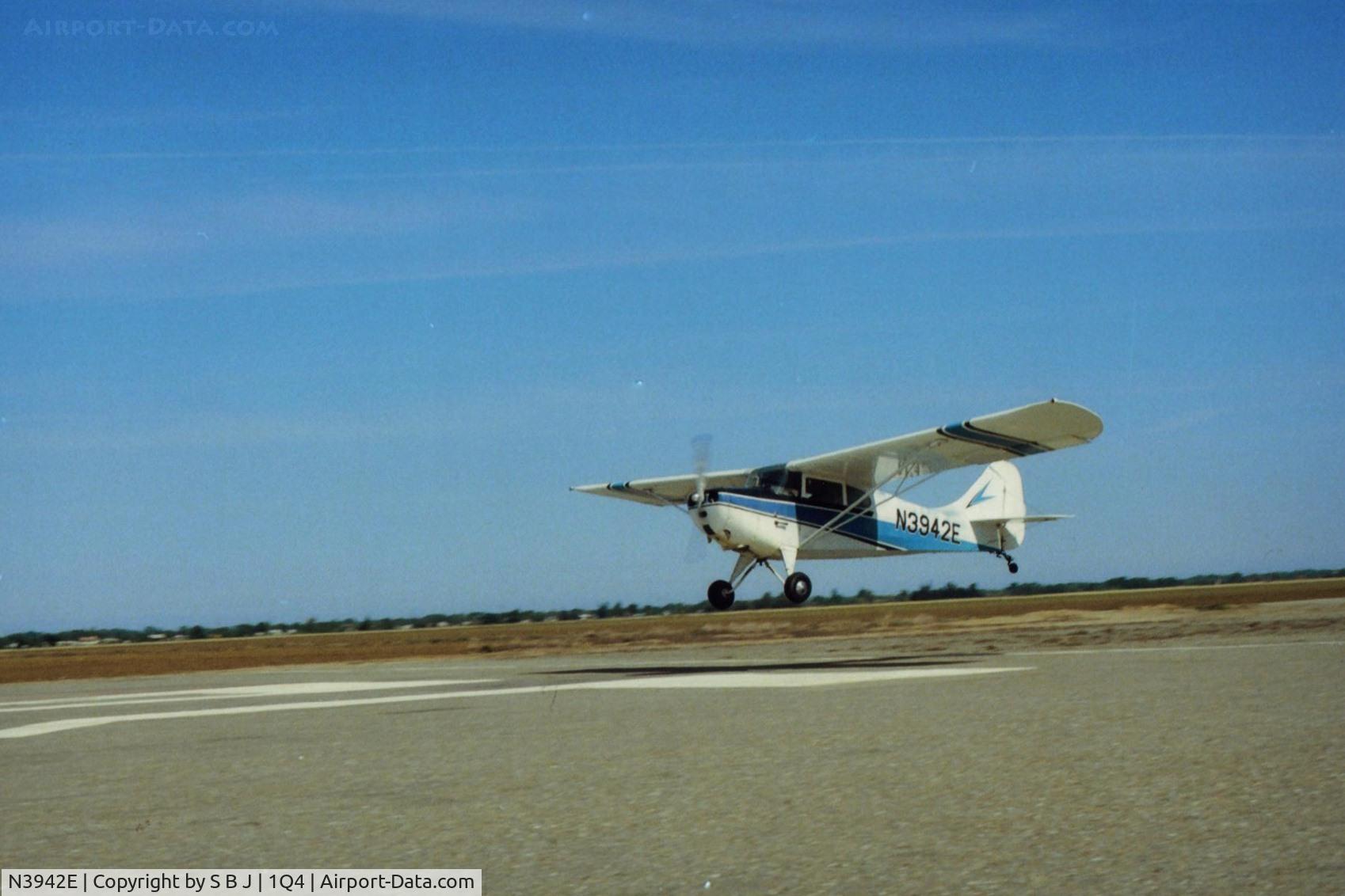 N3942E, 1947 Aeronca 11BC Chief C/N 11BC-23, 42E with owner Jim setting up for a nice textbook 3 point landing on the numbers. He would consistently land  in 300 feet or less.1Q4 had an irrigation ditch near threshold (caused 1Q4 closure for a year). This discouraged landing short.